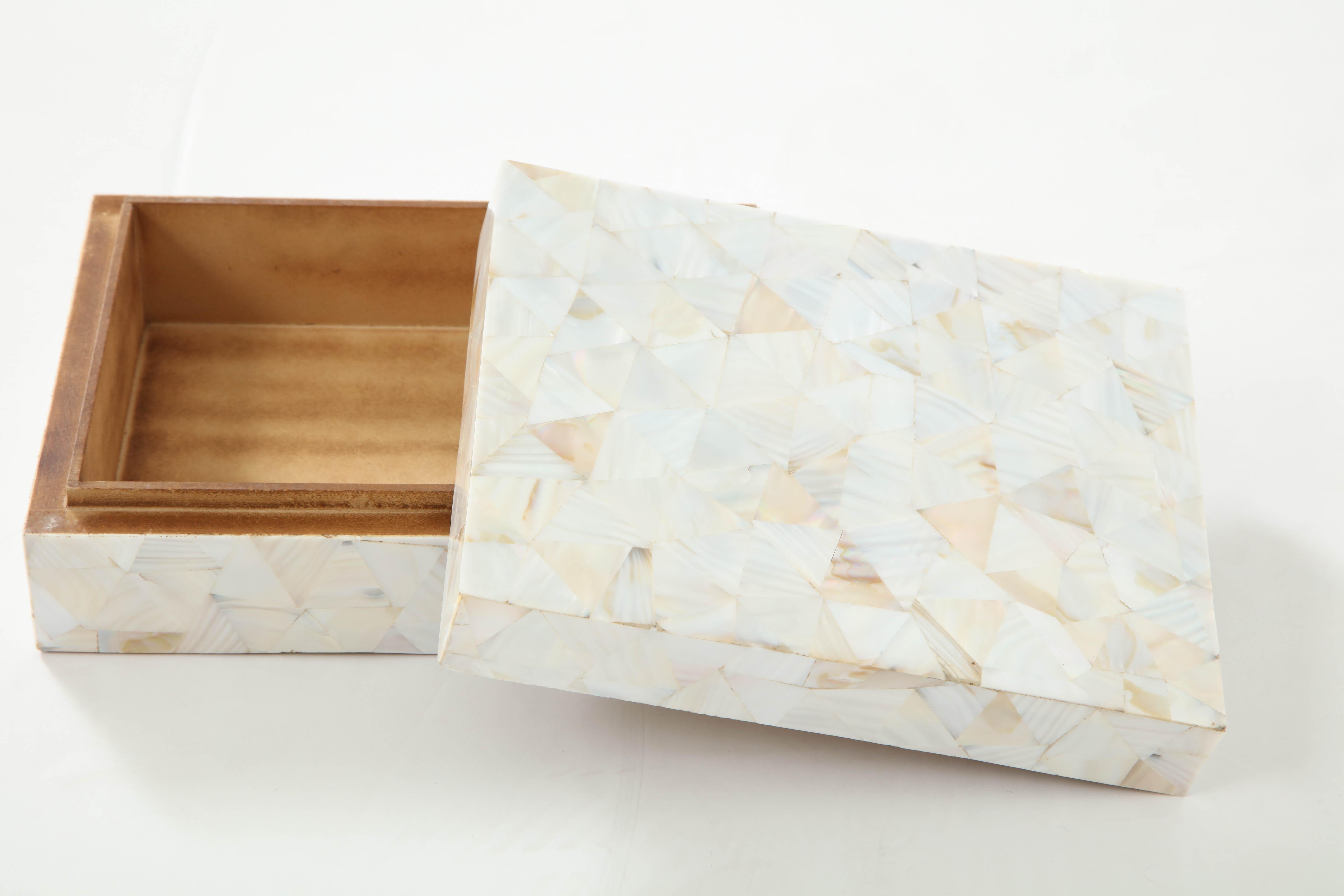 Mother-of-Pearl mosaic decorative box lined in wood.