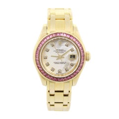 Mother of Pearl Diamond Dial Sapphire Bezel Watch