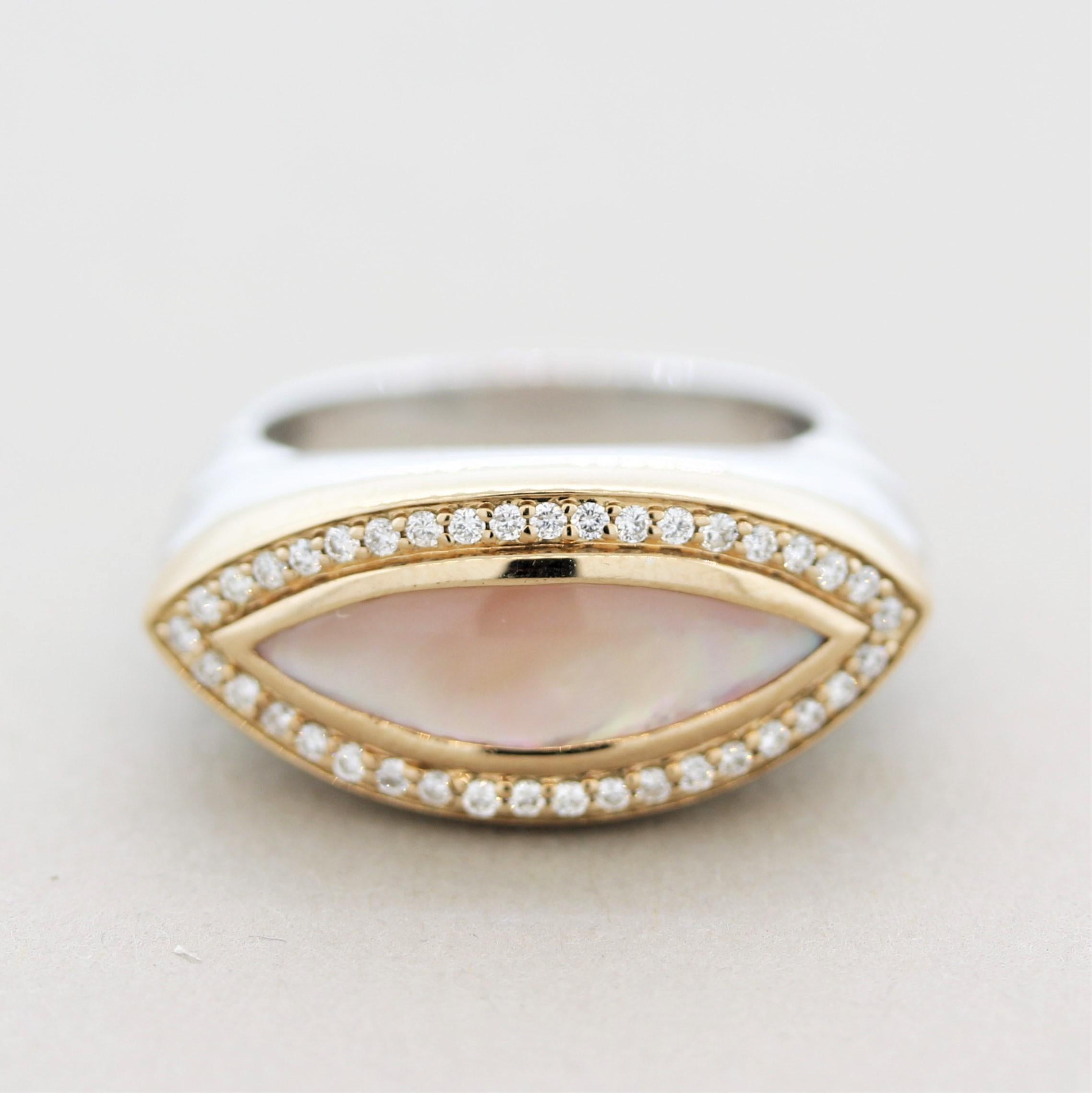 A sweet wing featuring a lovely pink mother of pearl. It displays excellent iridescence as an array of rainbow colors can be seen across the pink stone. It is accented by 0.38 carats of round brilliant-cut diamonds set around gem and adding