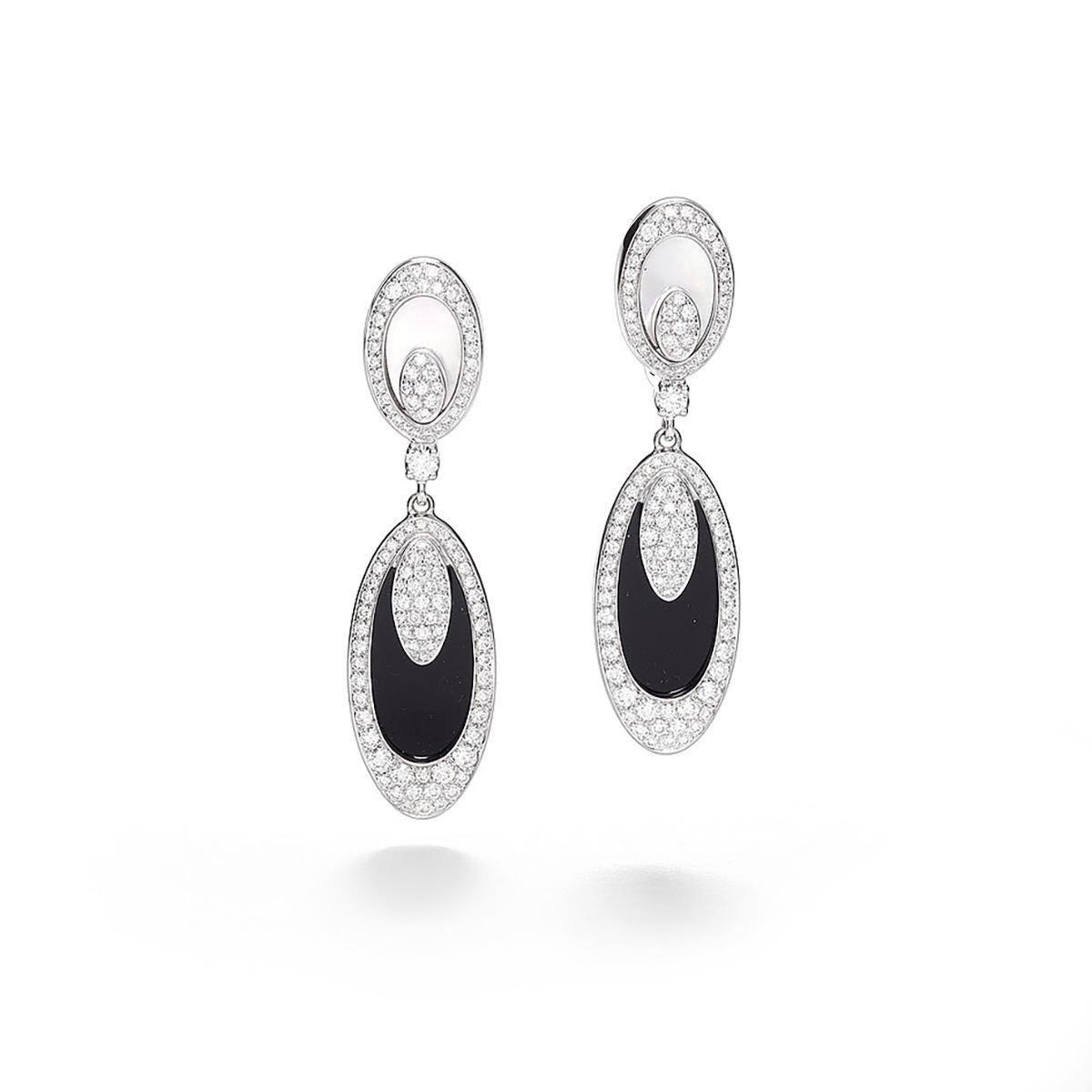 Earrings in 18kt white gold set with 222 diamonds 1.62 cts, 2 onyx 4.86 cts and 2 mother-of-pearl 1.19 cts        