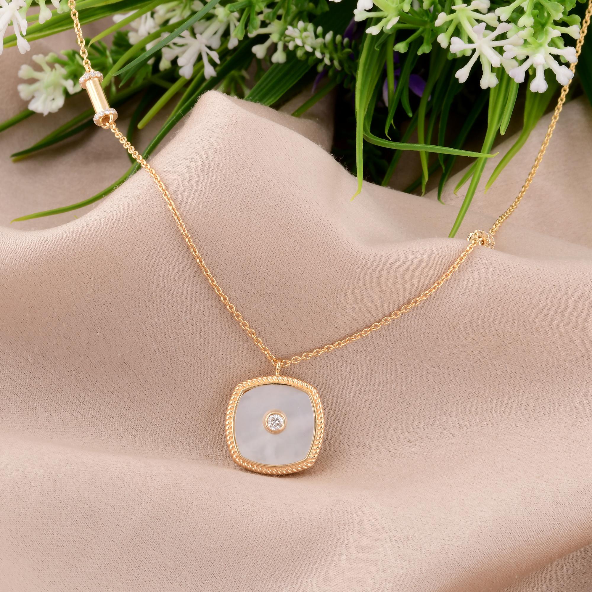 The design of the necklace is both elegant and versatile, with the mother of pearl charm suspended from a delicate yellow gold chain. The timeless charm necklace style adds a touch of whimsy and femininity to any ensemble, making it the perfect