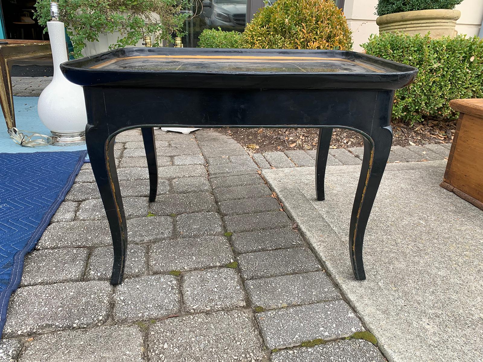 Mother of pearl inlaid and painted black coffee table.
