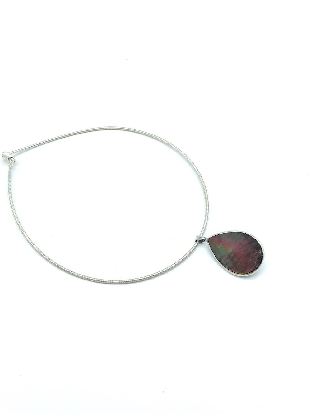 Mother of Pearl, Mobee Pearl Necklace Wire, Pendant 
Gray Luminous, Pearl set in a near 1-3/4 x 1-inch, pear shaped drop set in bezel. 
Neck wire is a 1.90 mm rounded wire, 18 inches in length 
12.3 gram of weight 
Back side of pearl is a colorful