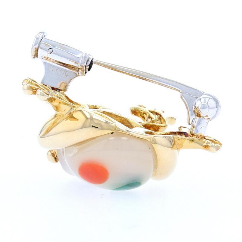 This delightful brooch would make a great gift for someone who treasures Asch Grossbardt artistry. Fashioned in 14k yellow gold, the brooch is a beautifully-detailed frog styling a Mother-of-Pearl body adorned with inset cabochons of cobalt-blue