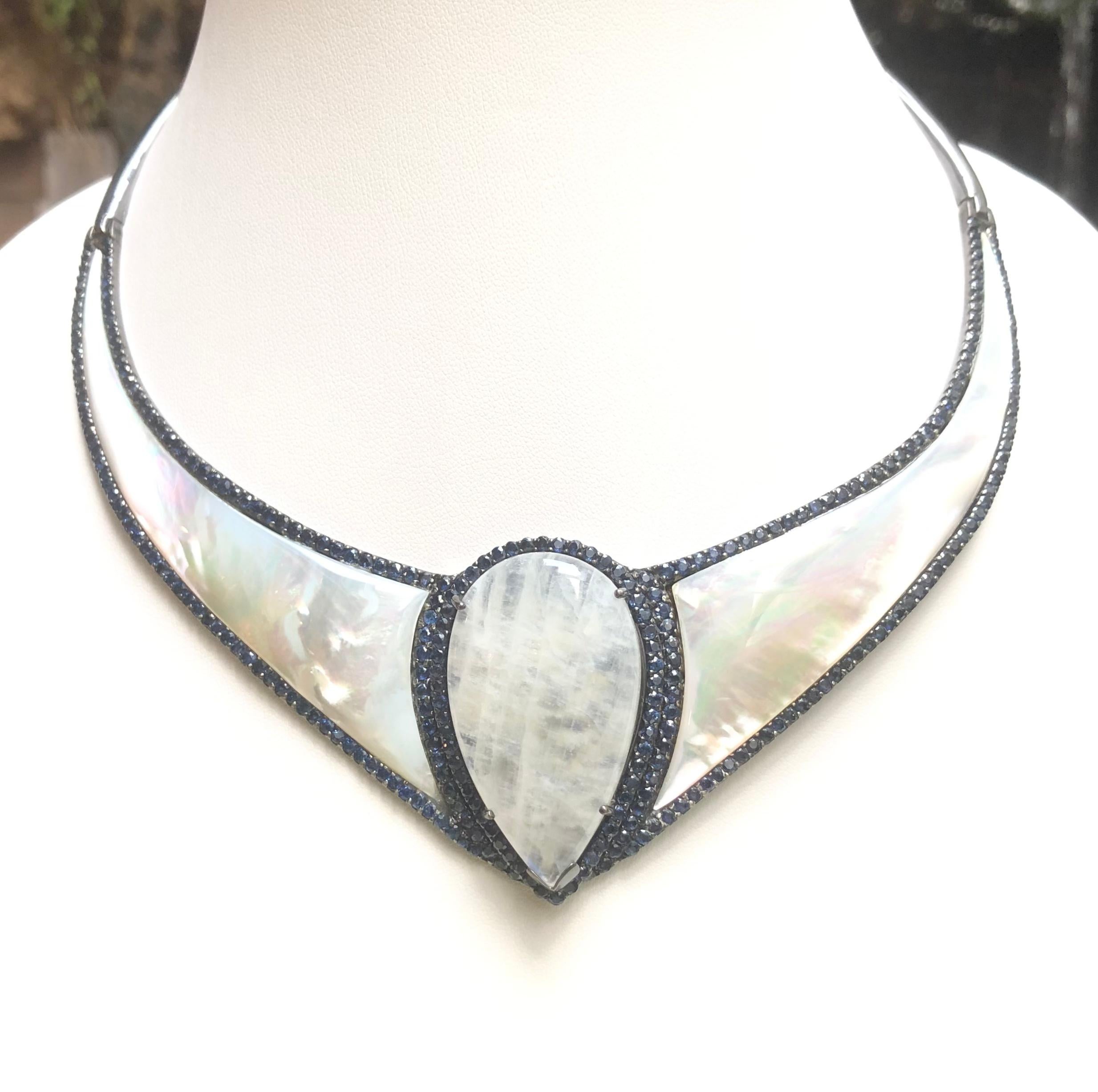Mother of Pearl, Moonstone and Blue Sapphire Necklace set in Silver Settings

Width:  4.1 cm 
Length:  18.0 cm
Total Weight: 108.3 grams

*Please note that the silver setting is plated with rhodium to promote shine and help prevent oxidation. 