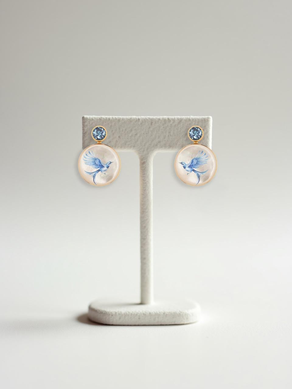 Mother Of Pearl Shell Stud Earrings with topaz and blue bird drawing. Handmade Paint Blue Bird Shell Earrings with moissanite. Beach Wedding bridal stud earrings. Mother of pearl beach earrings. Shell paint earrings. Wearable art earrings studs.