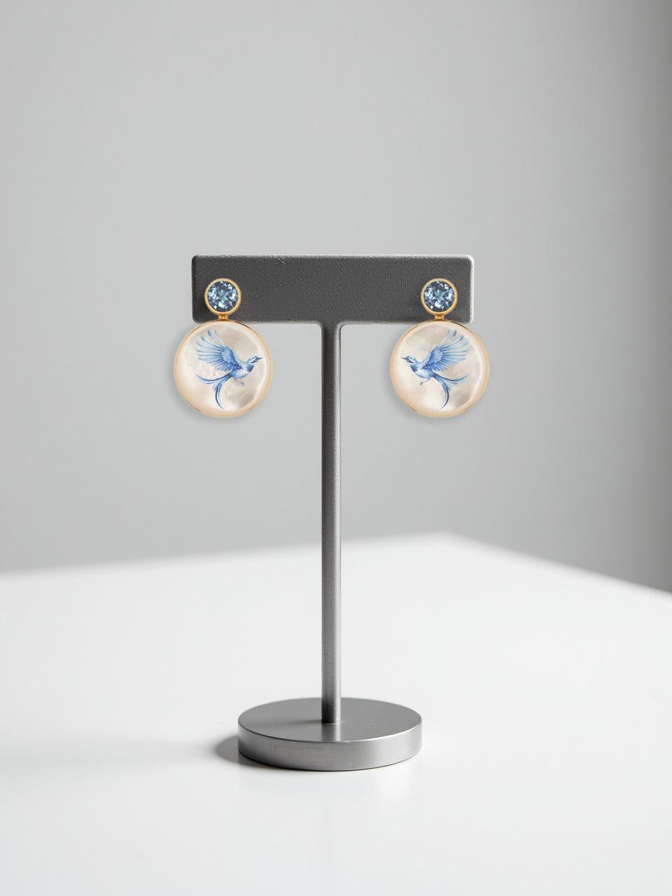 Moderno Mother Of Pearl Shell Stud Earrings with topaz and blue bird painting. in vendita