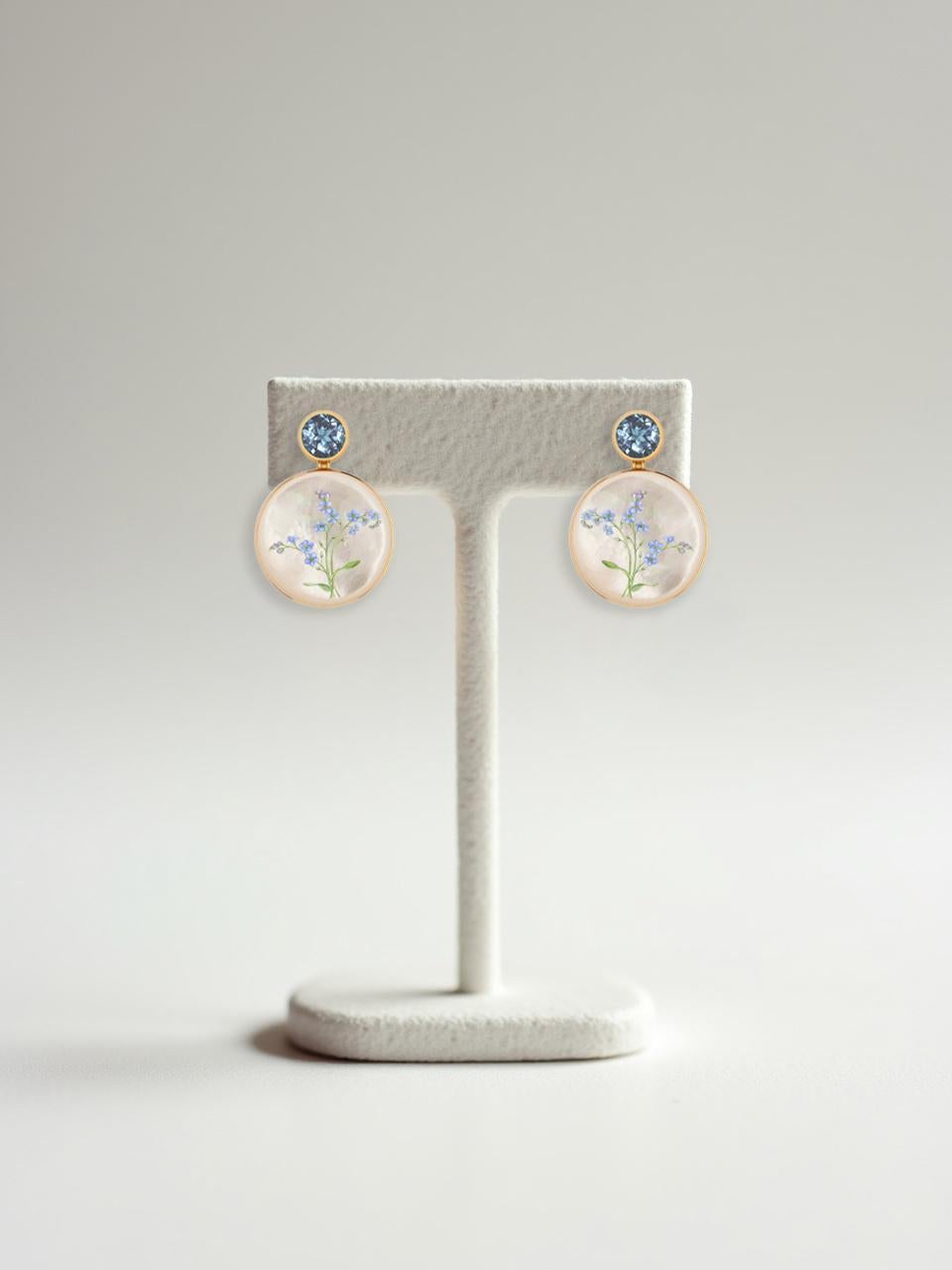 Moderno Mother Of Pearl Shell Stud Earrings with topaz and forget-me-nots painting. in vendita
