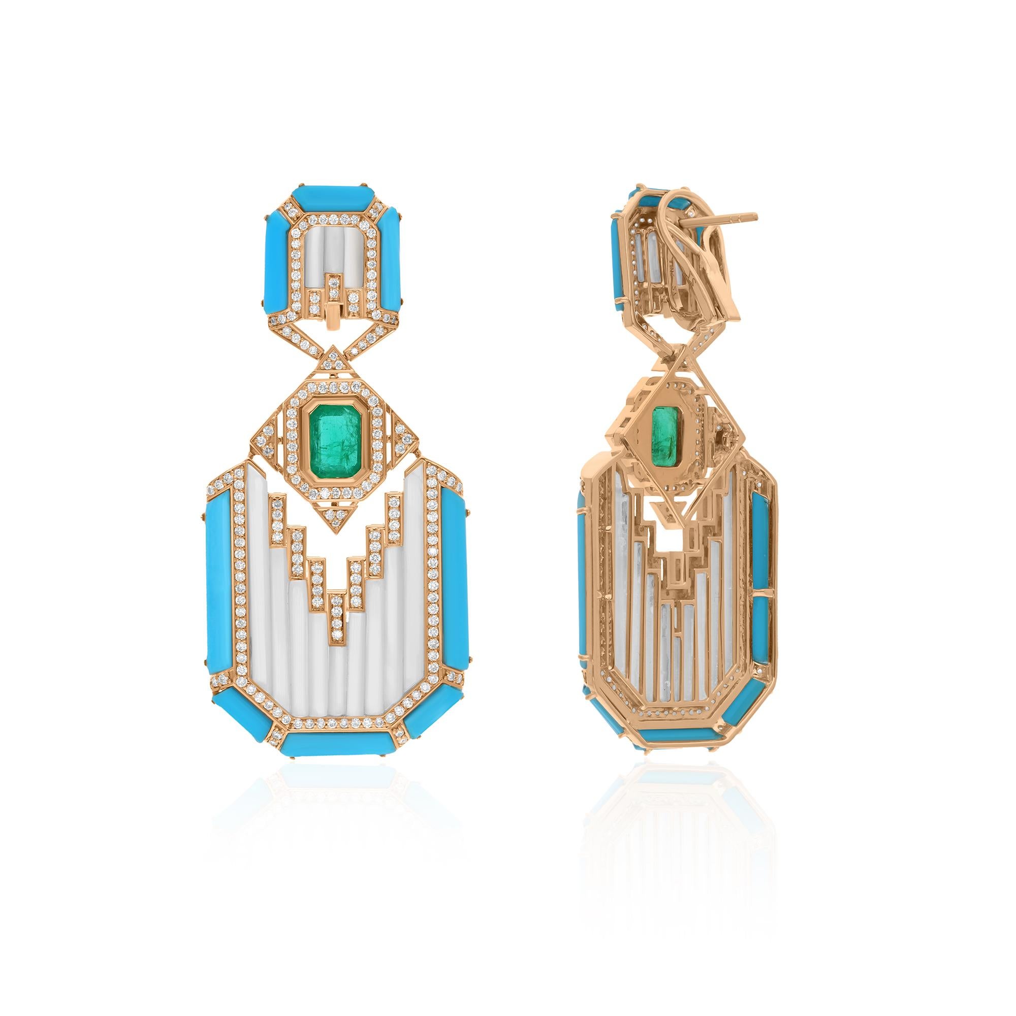 At the heart of each earring lies a luminous Mother of Pearl Turquoise gemstone, radiating with ethereal beauty. The soft iridescence of the Mother of Pearl, combined with the vibrant hues of the Turquoise, creates a captivating contrast that