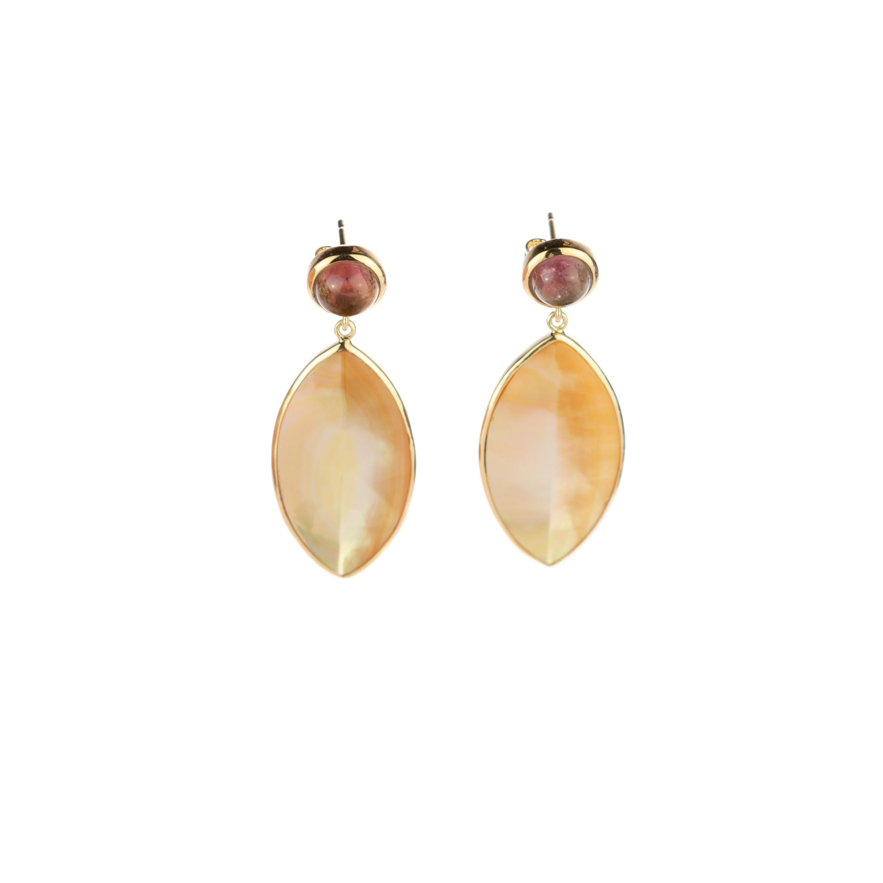 Rare and magnificent 25 carats Mother of Pearl leaves earrings surrounded with 18 karat yellow gold embellished each in a leaf shape perfect for a stunning night! The round 5 carats tourmaline cabochon recreates a vintage look with a comfortable