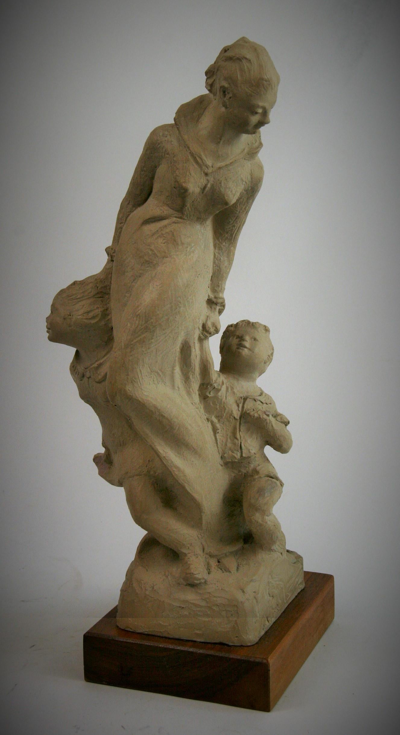 2-295 mother with 2 small children cast stone figurative sculpture on walnut wood base
Austin Productions 1983.