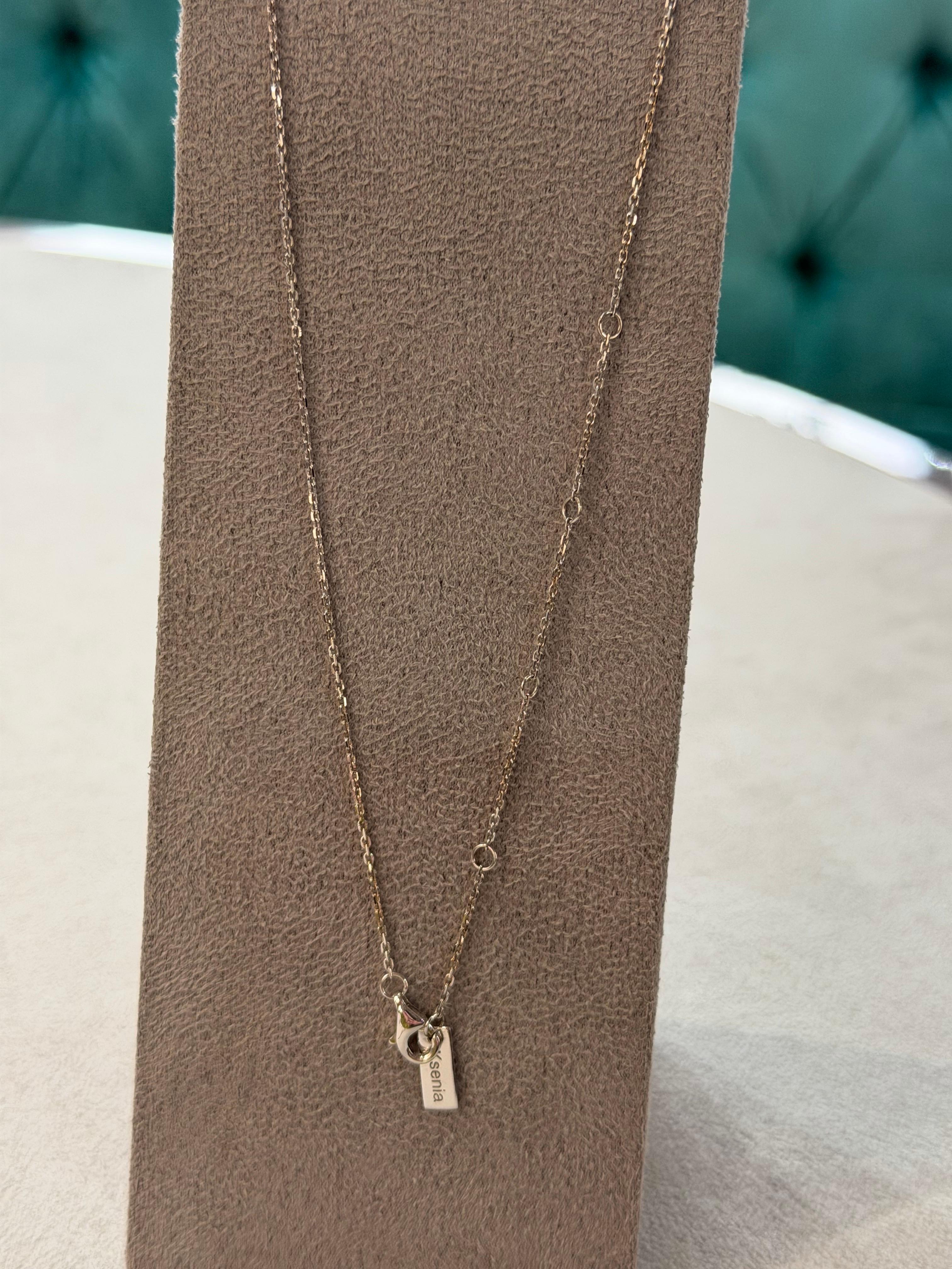 Collana Motif in oro bianco con ciondolo e diamante bianco in vendita 2