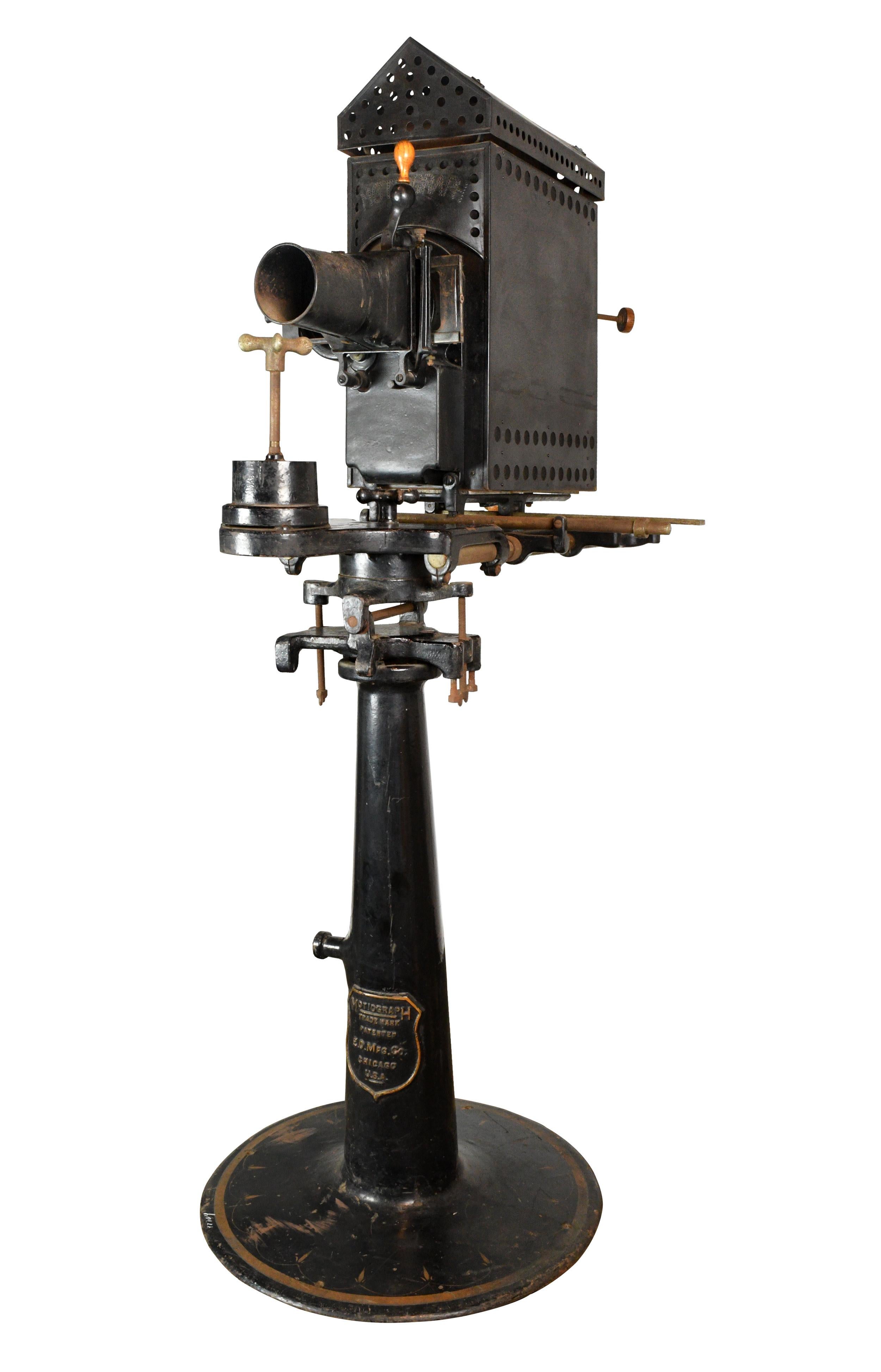 This Motiograph hand cranked silent movie projector would make an excellent conversation piece for the cinema lover, or the perfect project for an industrious DIY’er. An embossed emblem on the side of the pedestal reads “MOTIOGRAPH - TRADEMARK