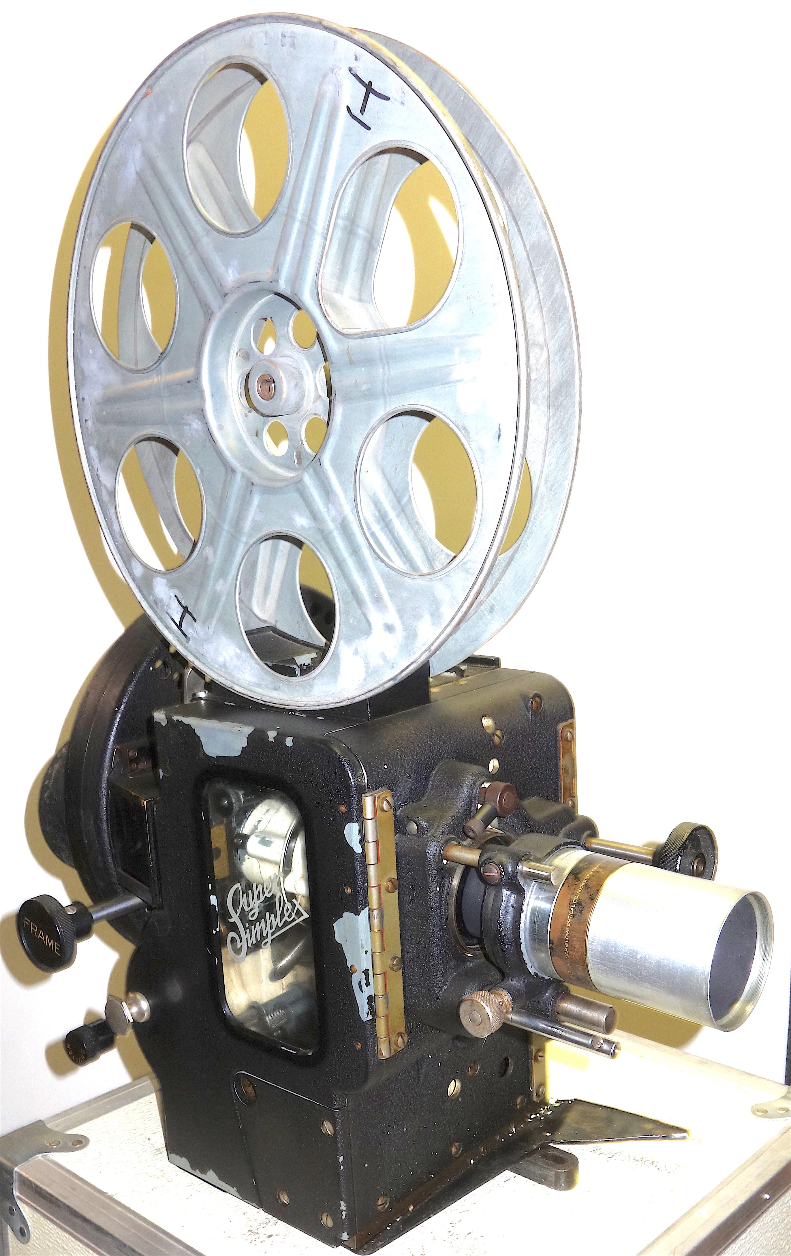 Suggest for your consideration is this 35mm Motion Picture Cinema Projector designed in 1922 and built in 1937. This highly patinated Super Simplex projector head is complete with turning movement. Includes lens, shutter, movement and lamp house