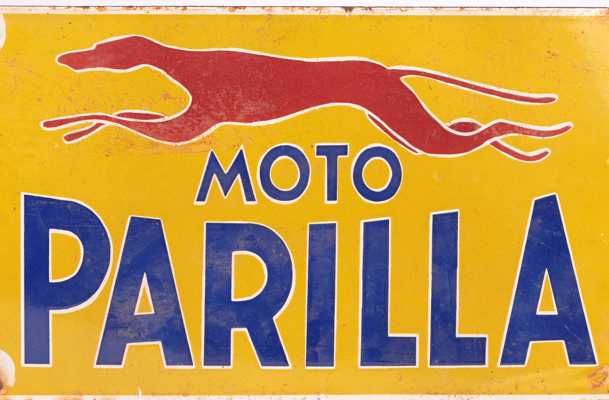 A very stylish mid-century Italian enamel signed advertising Moto Parilla motorcycles dating from around 1955. The sign of rectangular shape is heavily made and coated in thick enamels with the running dog motif in red and lettering MOTO PARILLA in