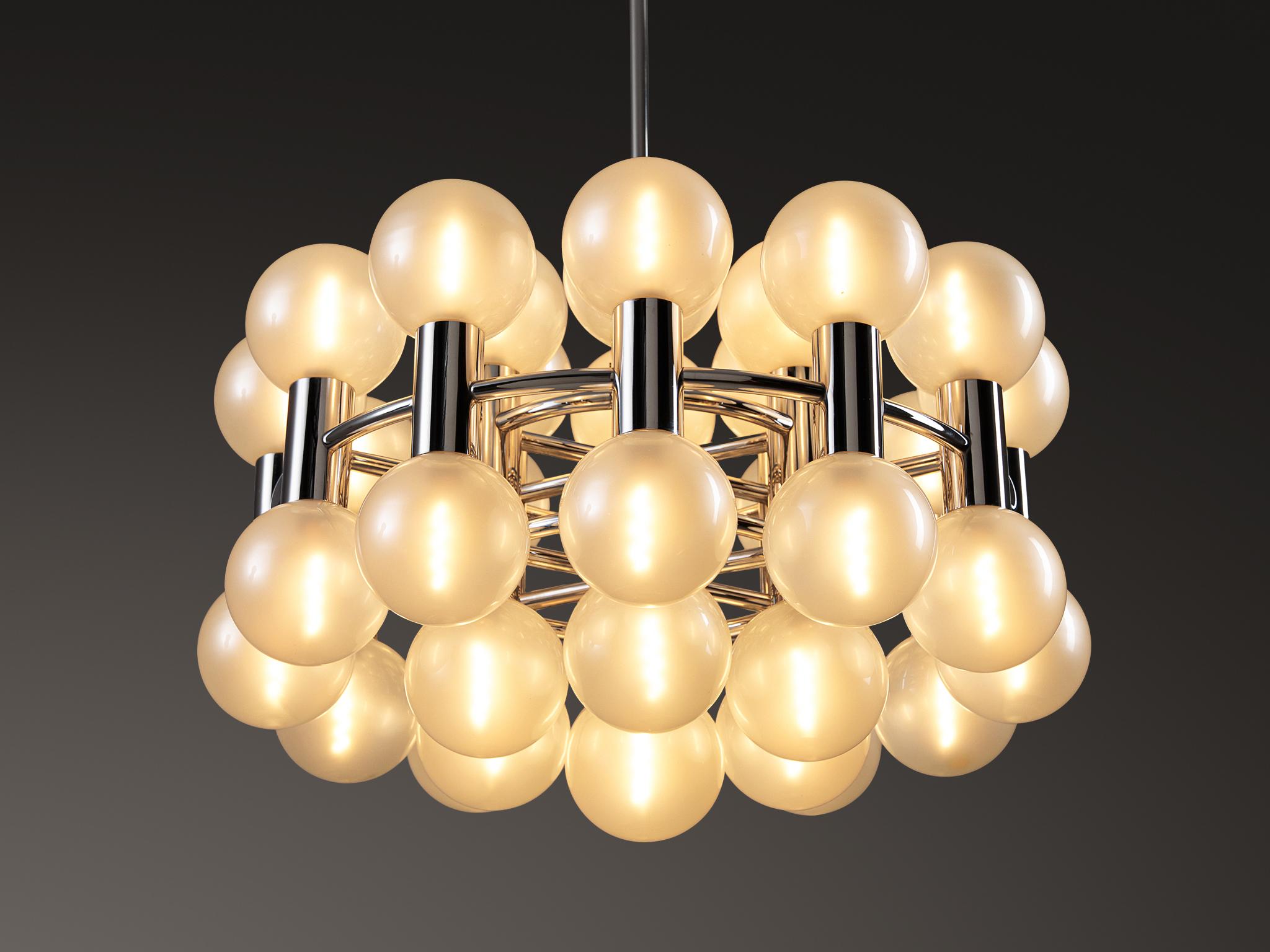 Motoko Ishii for Staff Leuchten, chandelier, chrome, glass, Germany, ca. 1970s

This magnificent chandelier, designed by renowned Japanese designer Motoko Ishii, showcases a striking blend of modernity and elegance. The design features a remarkable