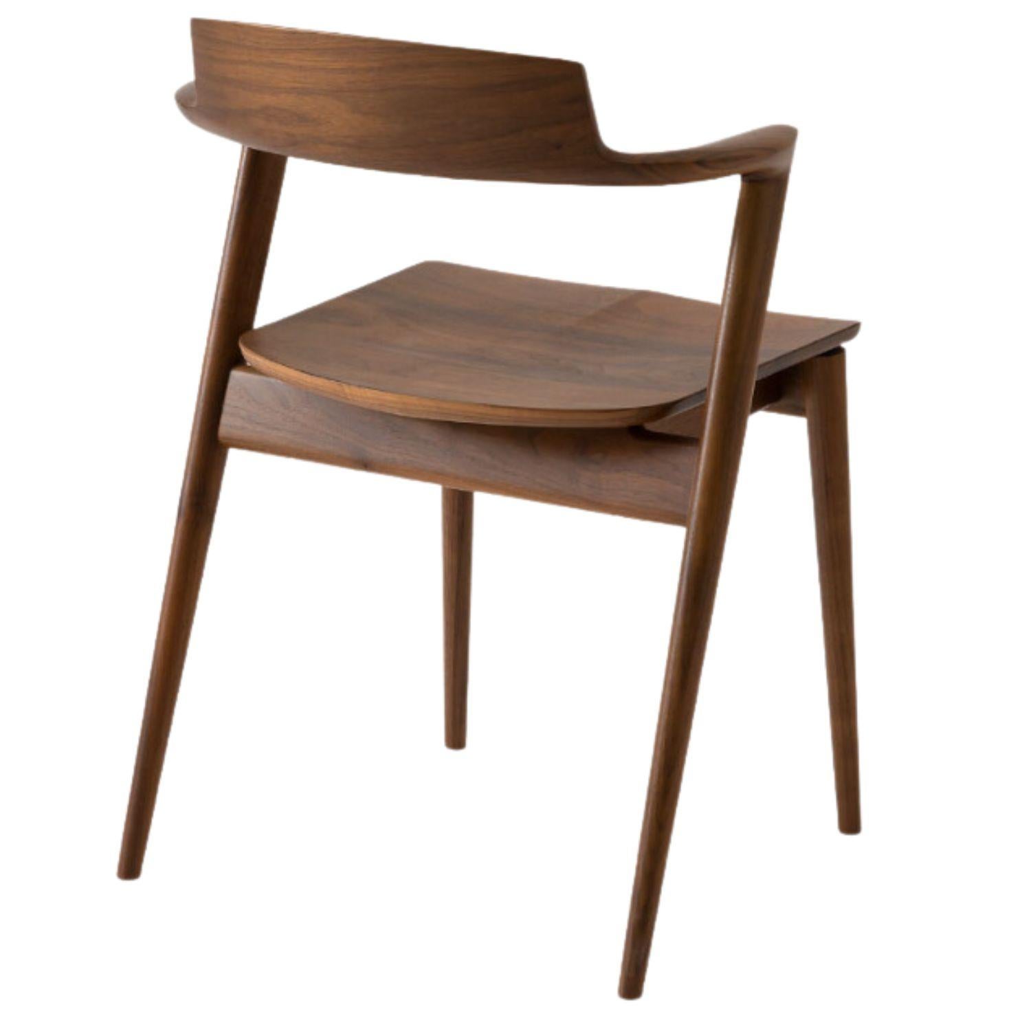 Motomi Kawakami 'Seoto KD21' semi-arm dining chair in walnut for Hida.

For centuries, famed Hida artisans in Gifu prefecture have played a role in Japan's woodworking culture, crafting iconic bentwood furniture from sustainable local forests.