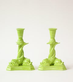 Mottahedeh Pair of Neoclassical Chartreuse Porcelain Dolphin-Form Candlesticks