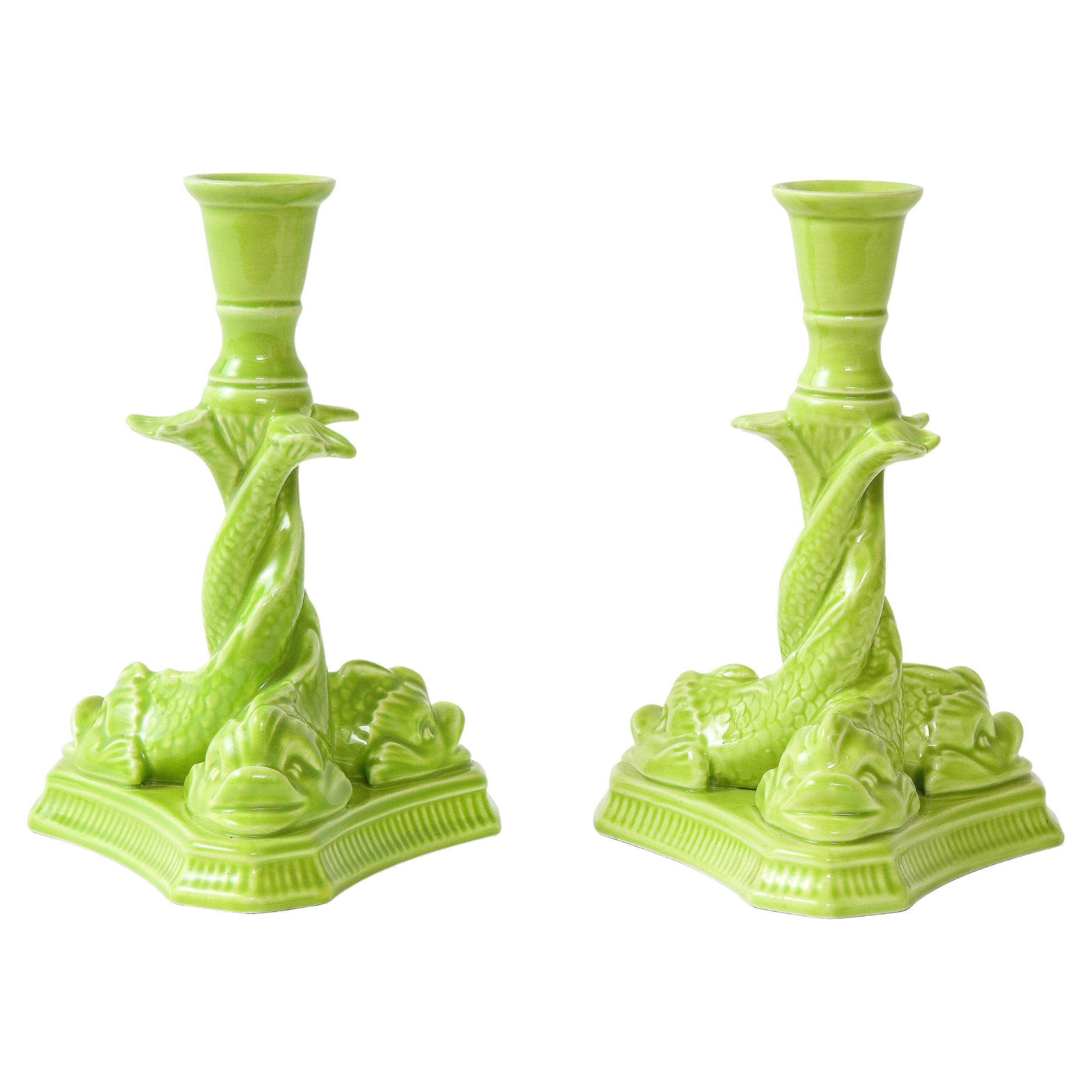 Mottahedeh Pair of Neoclassical Chartreuse Porcelain Dolphin-Form Candlesticks For Sale