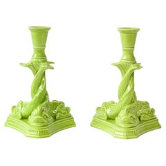 Mottahedeh Pair of Neoclassical Chartreuse Porcelain Dolphin-Form Candlesticks