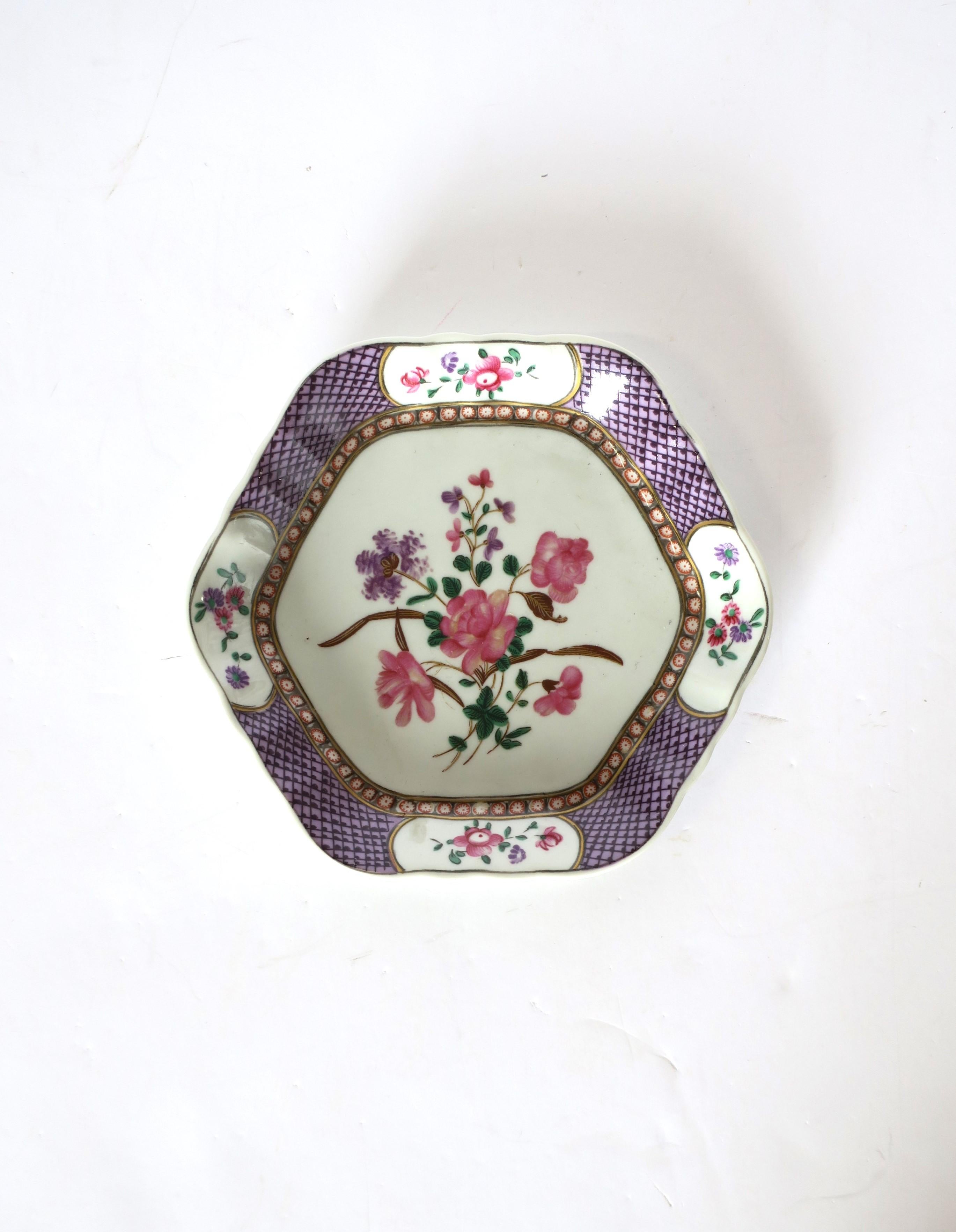 A white and purple hexagon shaped porcelain vide-poche jewelry dish by Mottahedeh for 'The Nelson Rockefeller Collection', circa mid-20th century, made in Portugal. This was a special collection made by Mottahedeh after former US Vice President who