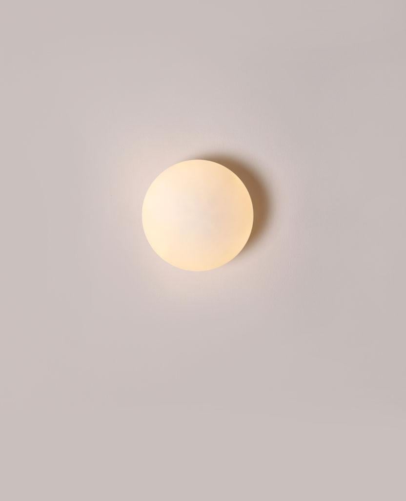 Mottle Glass Globe Medium Wall Sconce by Lamp Shaper
Dimensions: D 15.5 x W 18 x H 15.5 cm.
Materials: Brass and glass.

Different finishes available: raw brass, aged brass, burnt brass and brushed brass Please contact us.

All our lamps can be