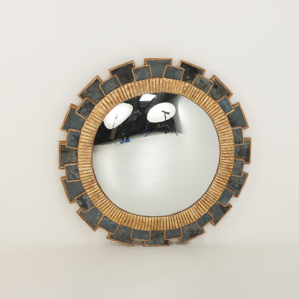 A fine gray mottled glass and resin convex mirror in the 