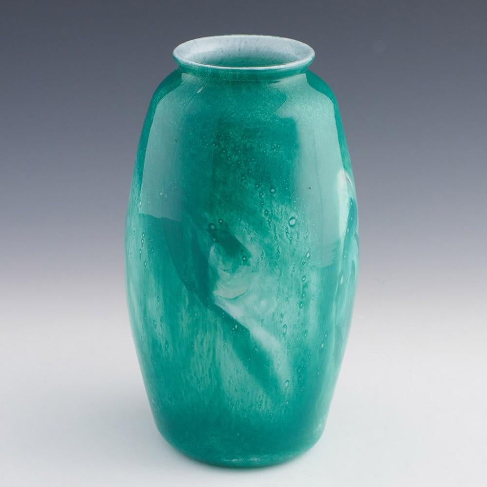 Heading : Mottled Gray-Stan glass vase
Date : c1930
Origin : London, England
Bowl Features : Mottled green and white glass
Marks : Incised Gray-Stan signature to base
Type : Lead
Size : 23.5cm height, 13cm diameter
Condition :Excellent, no chips or