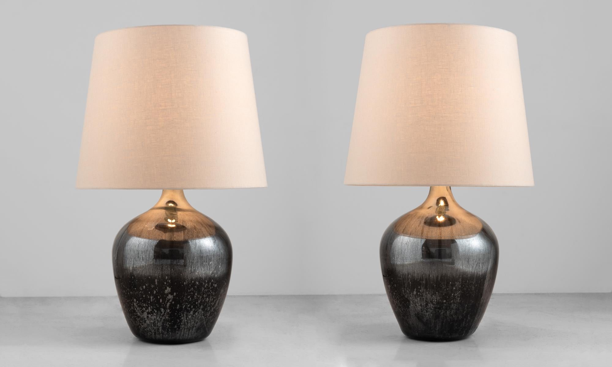 Mottled Mirrored Table Lamps, England circa 1940.

Originally used as a chemical storage bottle with incredible patina and surface. New linen shade.

20