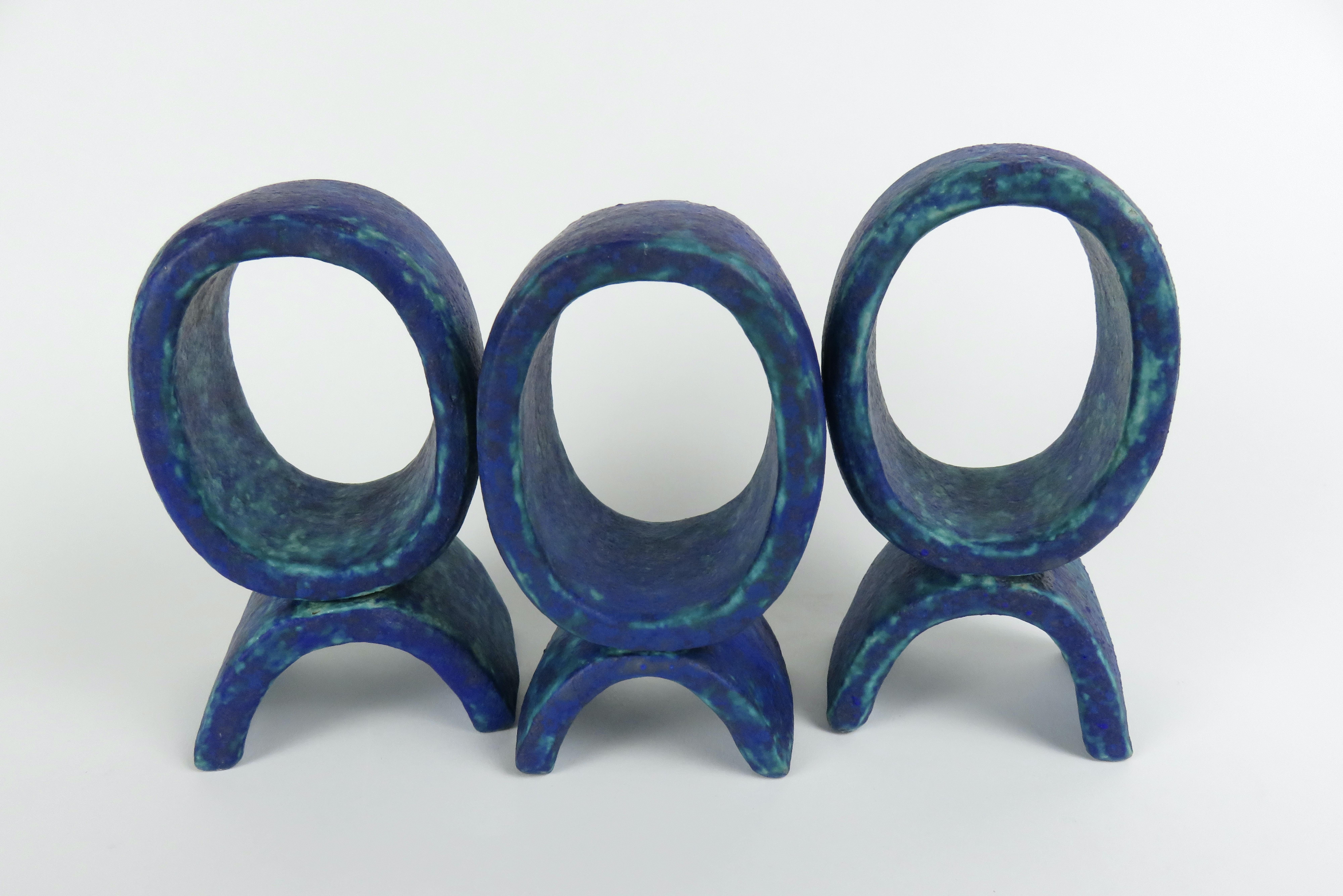 Hand-Crafted Mottled Turquoise and Deep Blue, 3 Ceramic Totems, Single Rings on Curved Legs For Sale