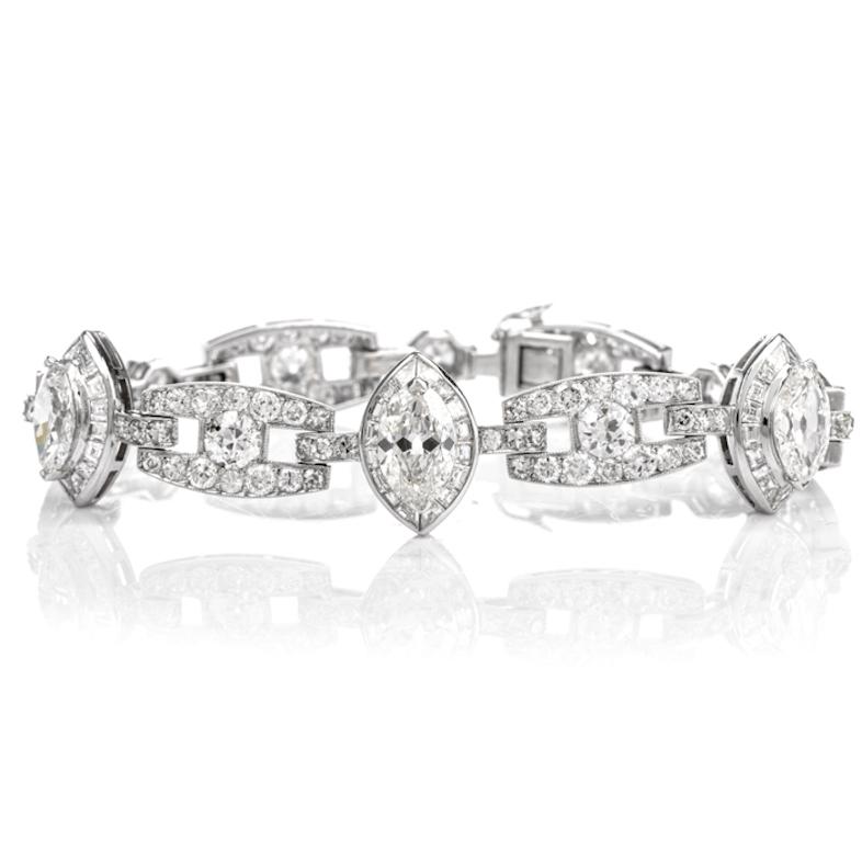  This luxurious Vintage diamond Art Deco bracelet is crafted in 18-karat white gold, weighing 25.3 grams and measuring 6.75” around the wrist. Composed of flexible pave-set ‘H’ shaped links and marquise-shaped links prong and bezel-set with an array