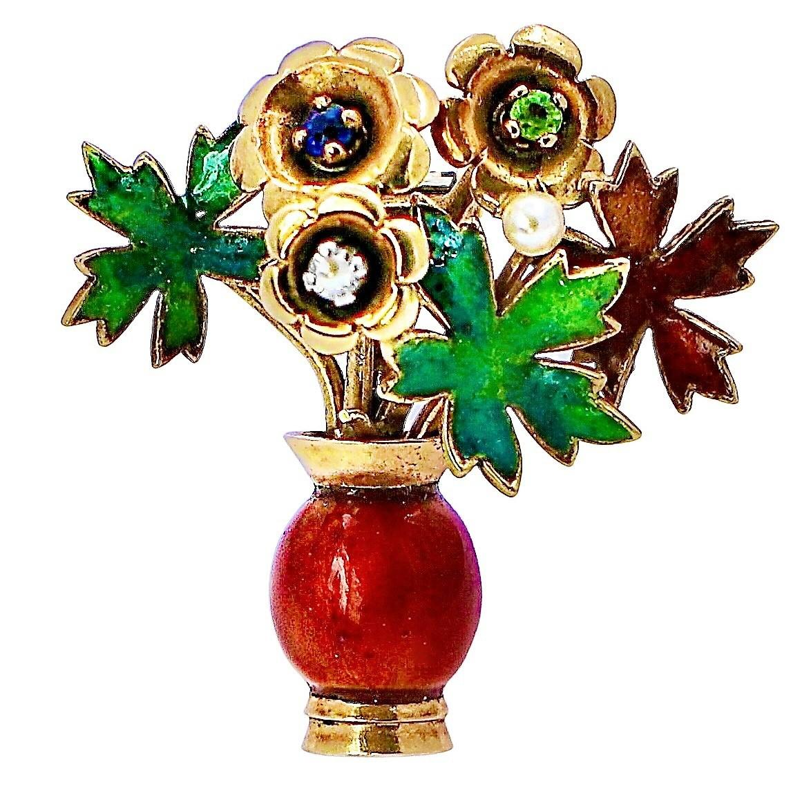 This distinctive 18K yellow gold original floral vase brooch is handmade and features three articulated flowers, each with a precious stone center. Green and bronze color enamel is delicately applied to the leaves and the vase with one natural pearl