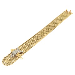 Manschettenarmband aus 18 Karat Gelbgold mit Mouboussin-Diamanten