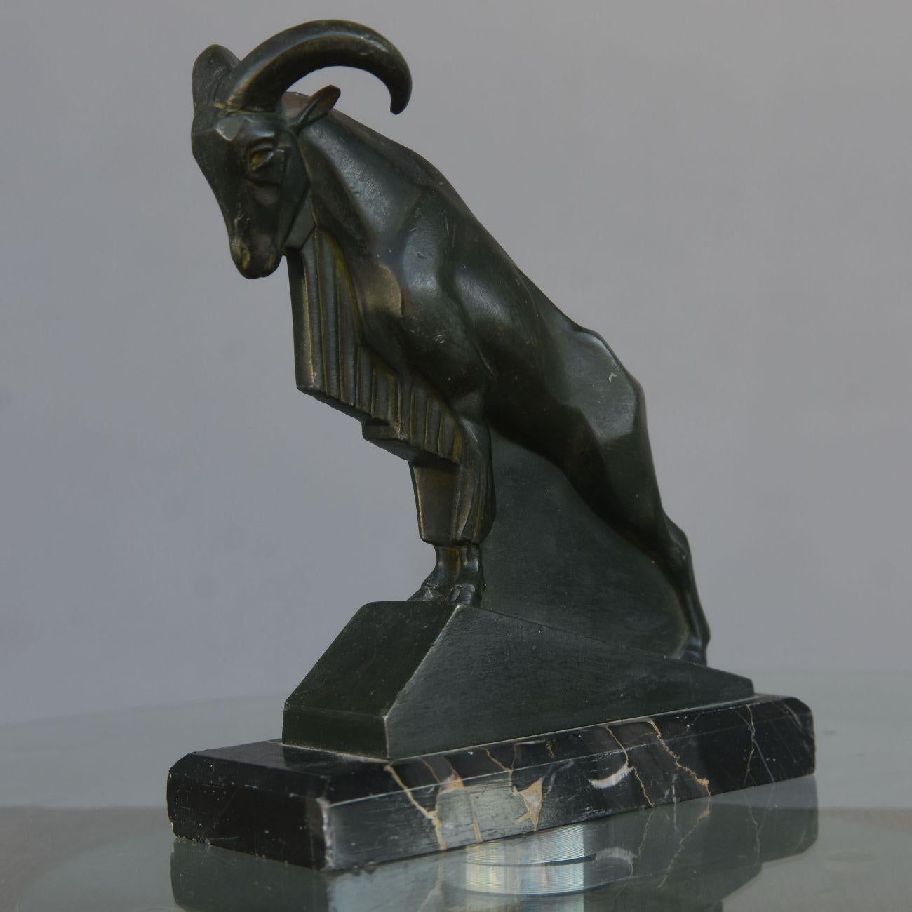 Mouflon in spelter patinated by Le Verrier on portor marble base.