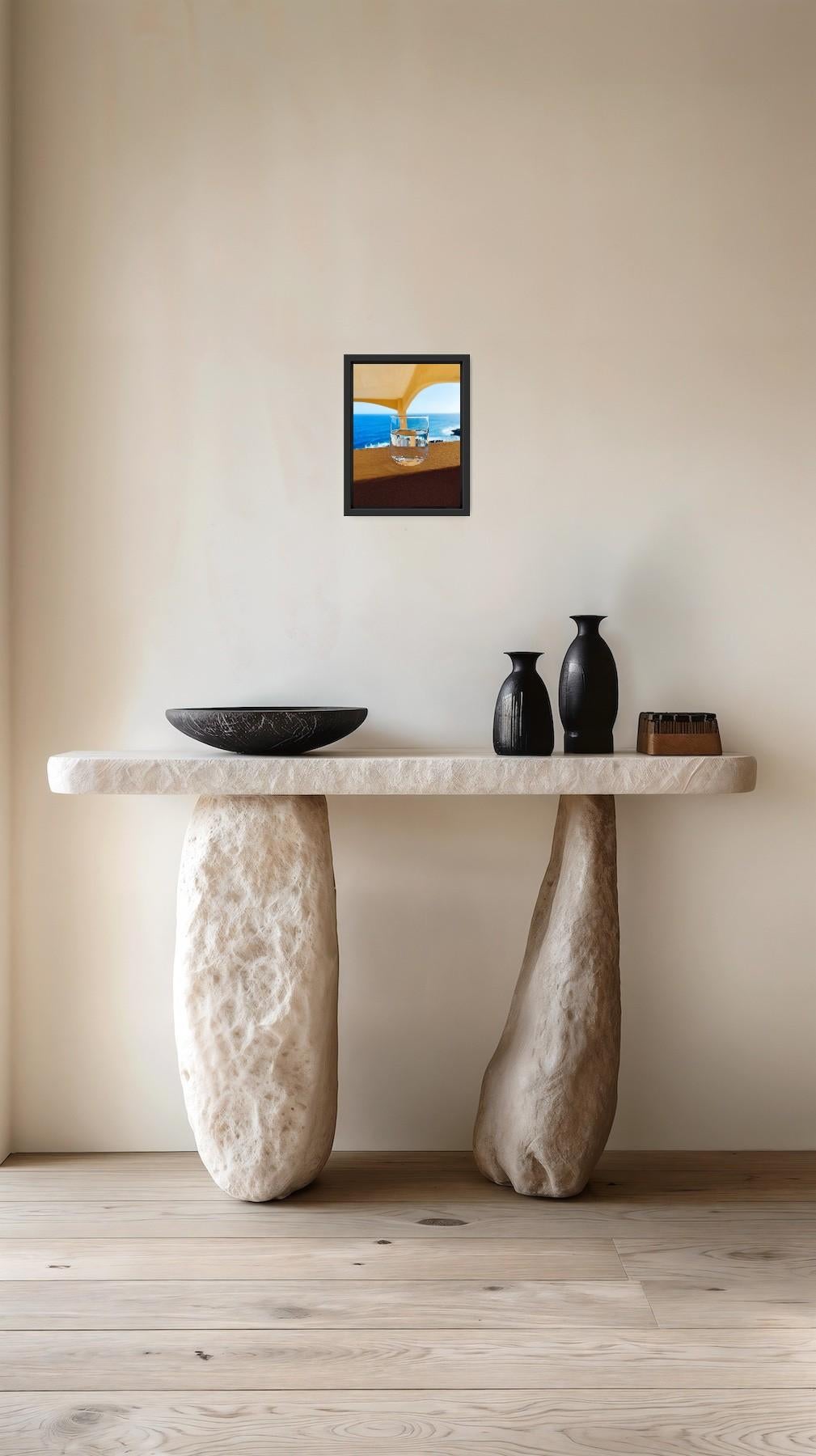 This contemporary minimalist still-life image, documenting a fleeting moment of calm, was taken by French artist Natalya Mougenot during her journey through Italy. A single glass of water sits in quiet contrast to the vast expanse of blue sky and