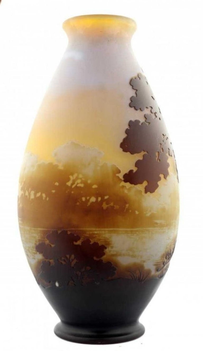 Émile Gallé (1846-1904)
Galle Cameo Glass Vase
France, circa 1910
Cameo signature Gallé
Height 8 3/8 in., Width 4 7/8 in., Depth 2 3/4 in. 
H 21.27 cm., W 12.38 cm., D 6.98 cm. 
LITERATURE
Alastair Duncan and Georges de Bartha, Glass by Gallé, New