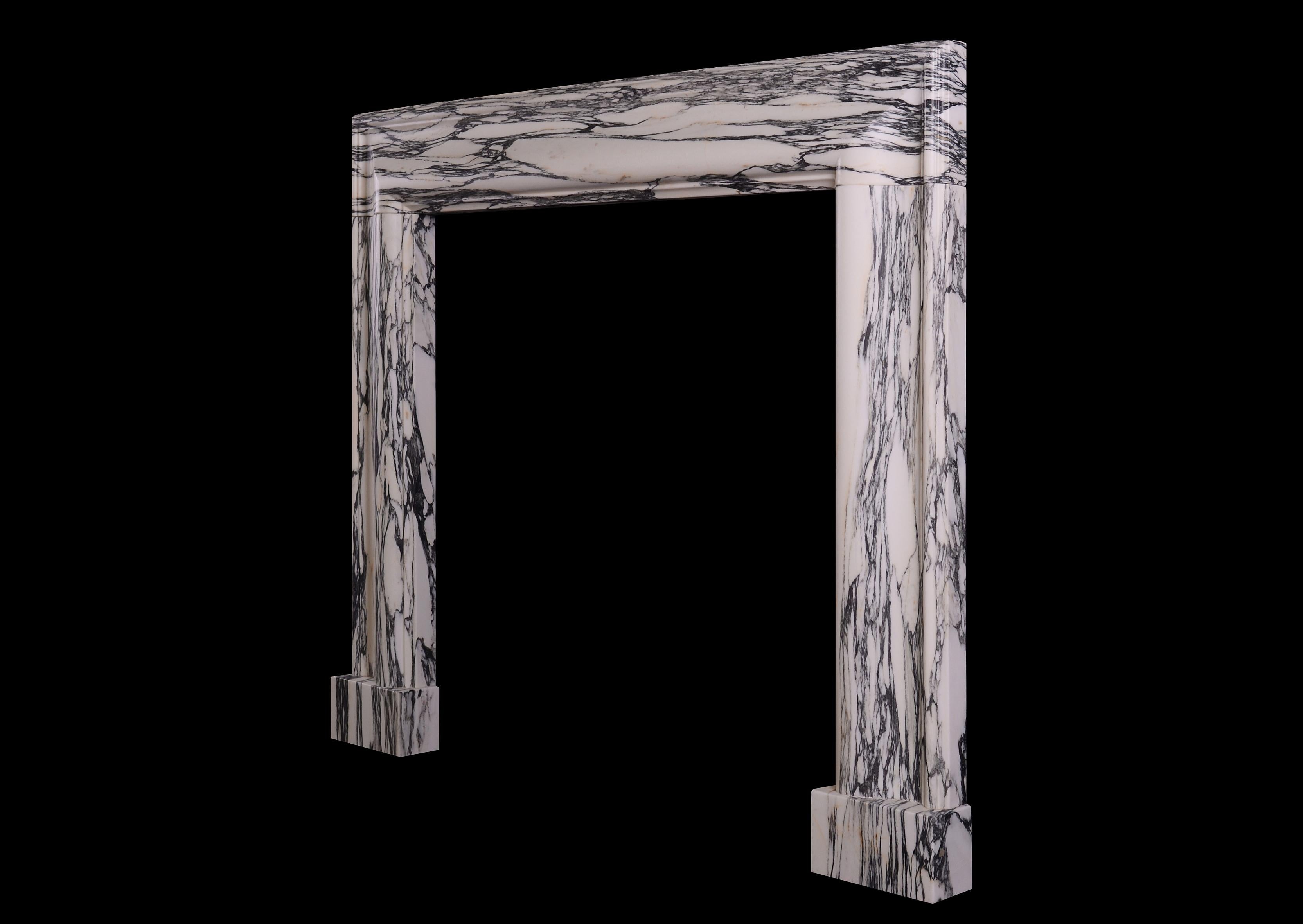 Moulded Bolection Fireplace in a Veined Marble 1