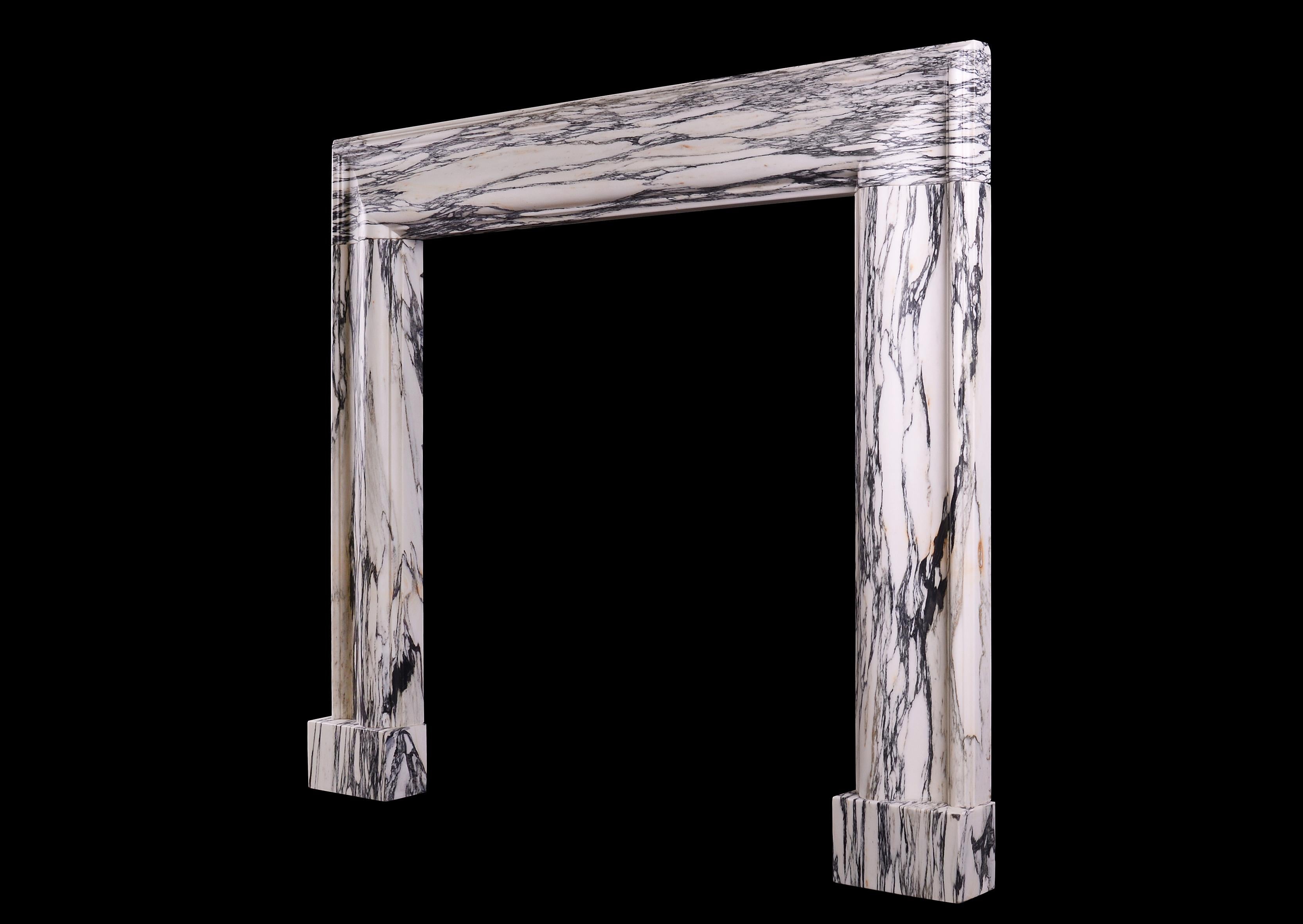 Moulded Bolection Fireplace in a Veined Marble 2