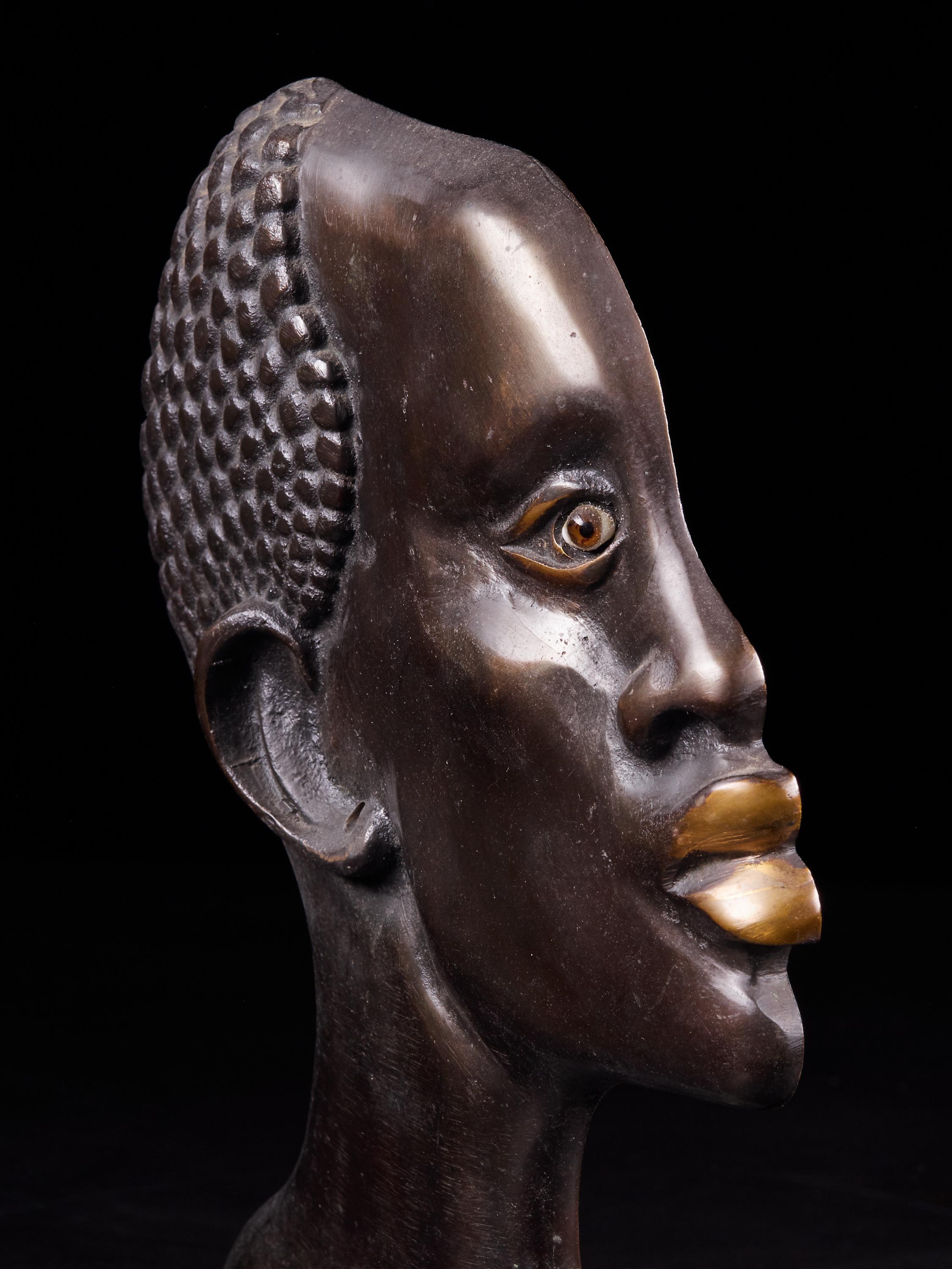 Hand-Crafted Moulded Copper Alloy Head of an African Figure with a Stone Base
