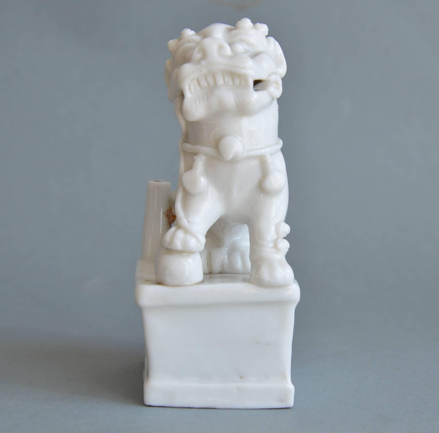 Moulded miniature figurine of a foo lion in Blanc de chine porcelain.
Provenance: China.
Period: Late 17th-early 18th century.
Medium: porcelain.
Dimensions: height 12.5 cm.
Condition: Good condition, small crack on the base, small chip on the