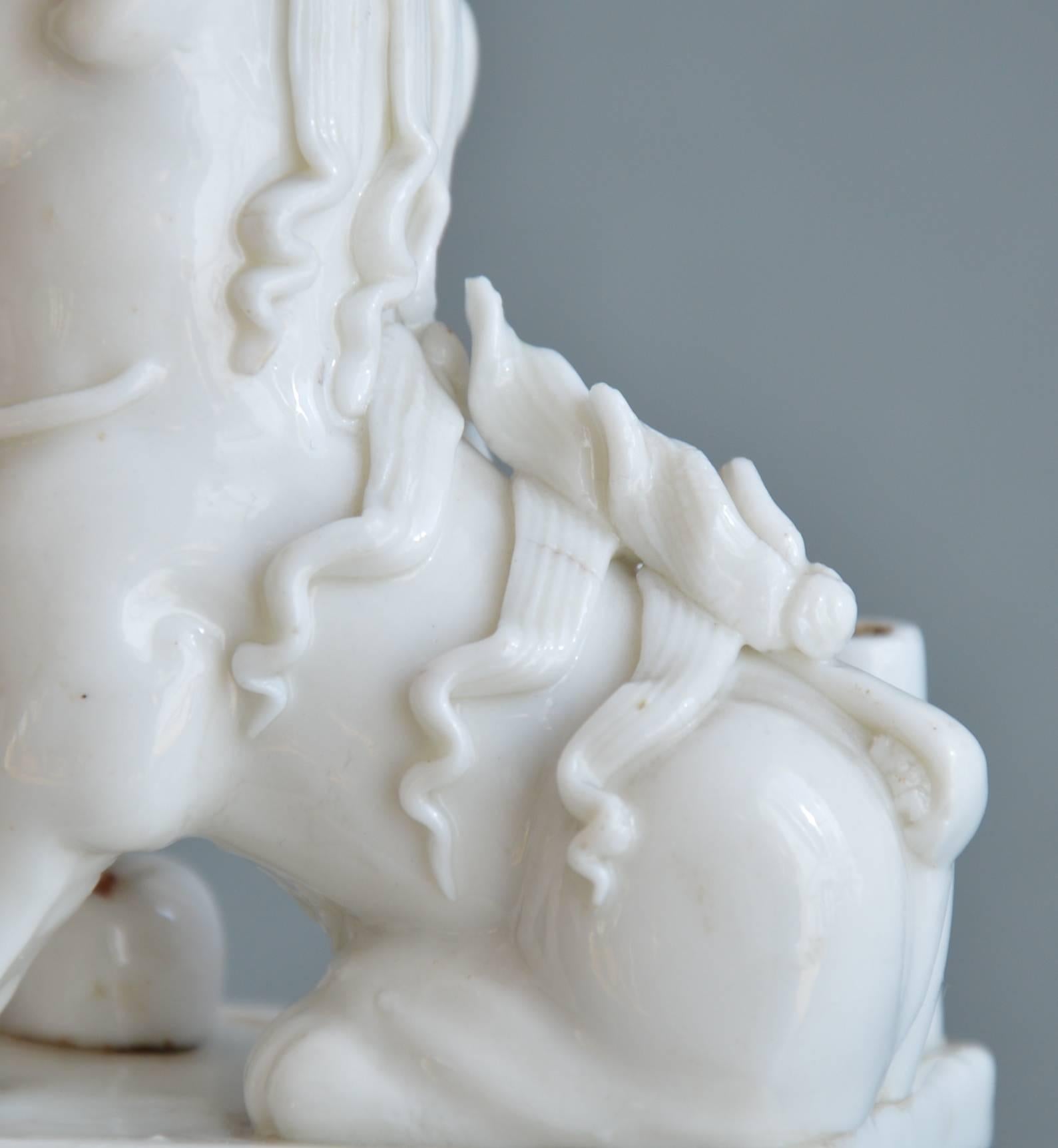 Early 18th Century Moulded Miniature Blanc de Chine Porcelain Figurine of a Foo Lion Kangxi