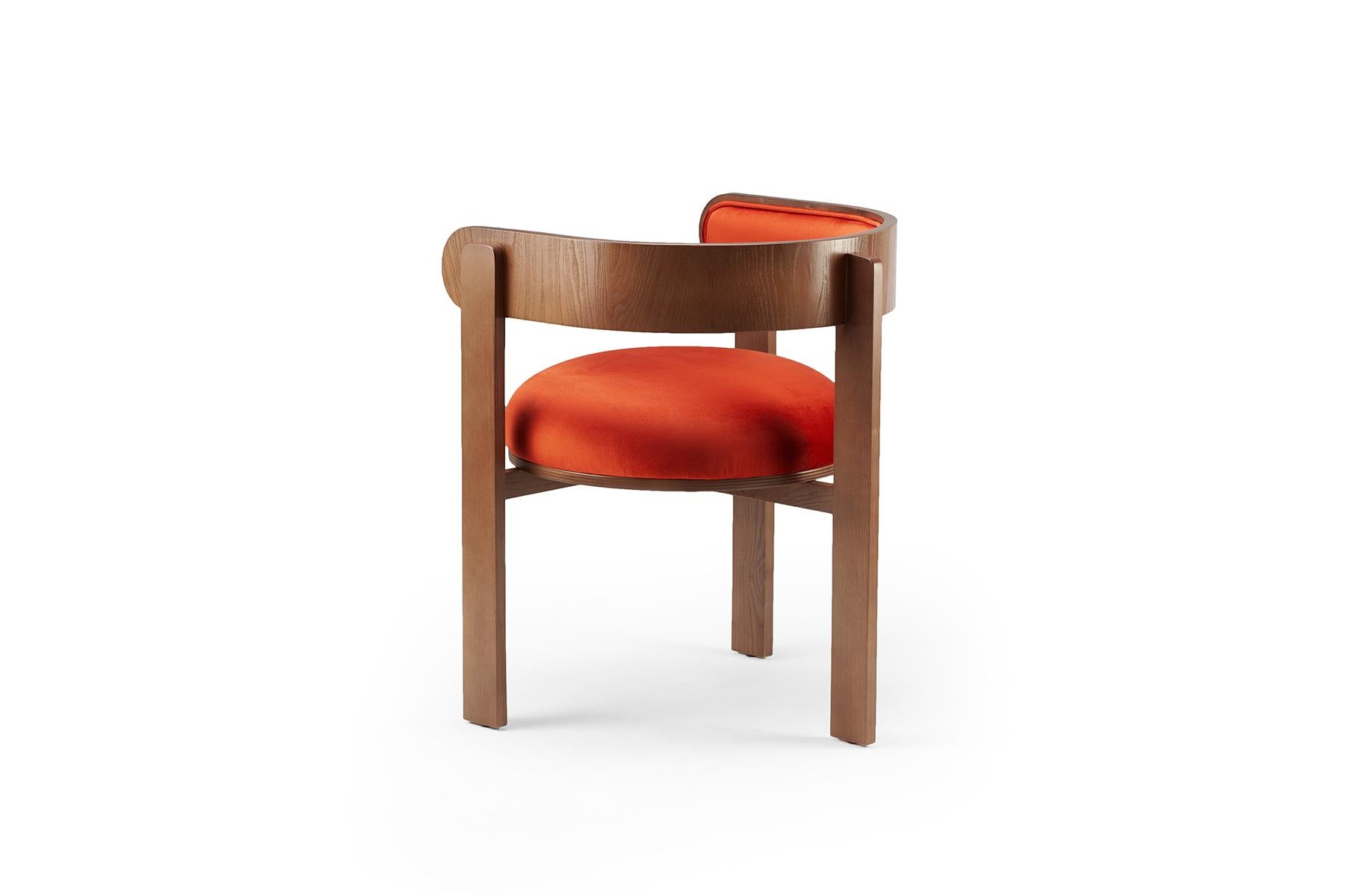 The clean and sensual lines of the Moulin chair make this piece a comfortable and exuberant one, adorned with piping and a bent wood structure which frames a perfectly round seat. Moulin chair invites guests with its fun and flirtatious feel,