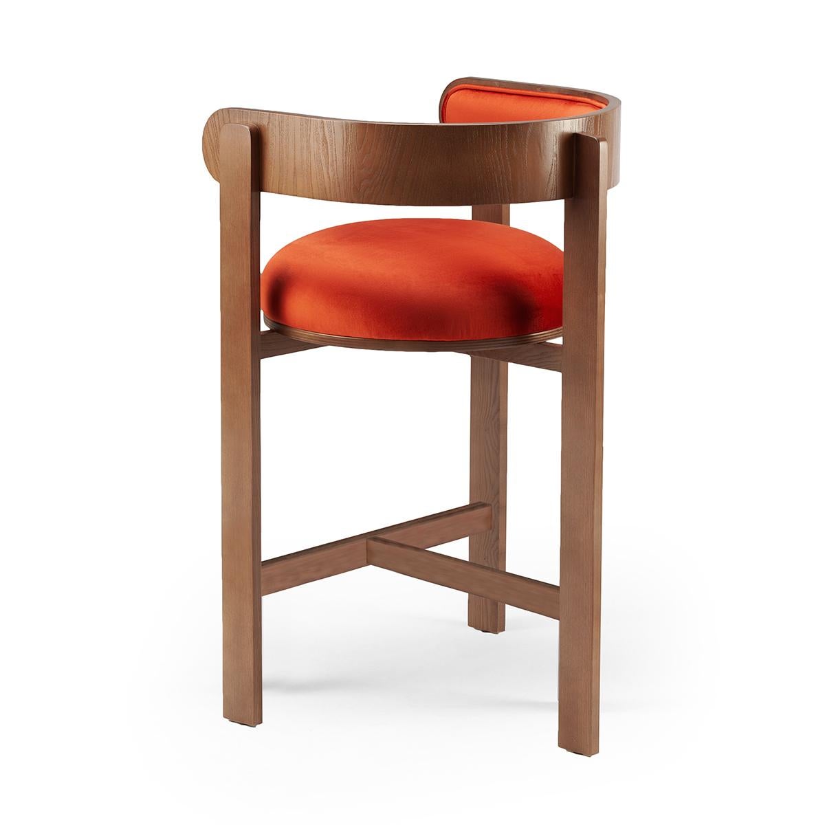 The clean and sensual lines of the Moulin chair make this piece a comfortable and exuberant one, adorned with piping and a bent wood structure which frames a perfectly round seat. Moulin chair invites guests with its fun and flirtatious feel,