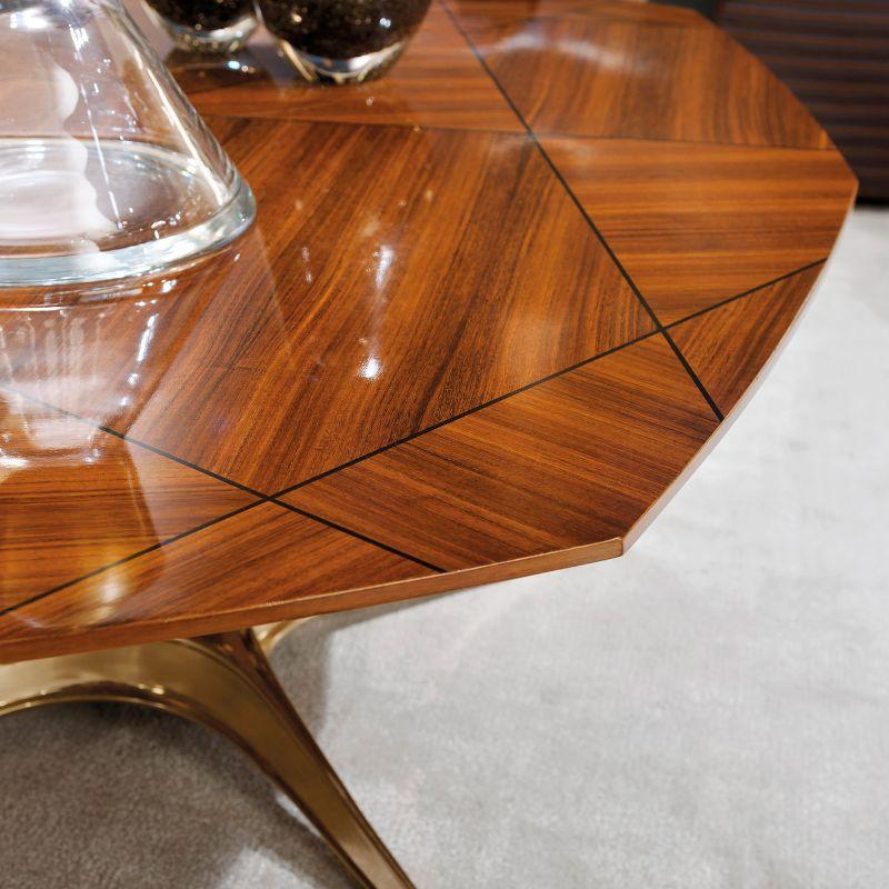 Cocktail table with brass and mahogany base and Mountain Santos rosewood top. Also available with marble top.