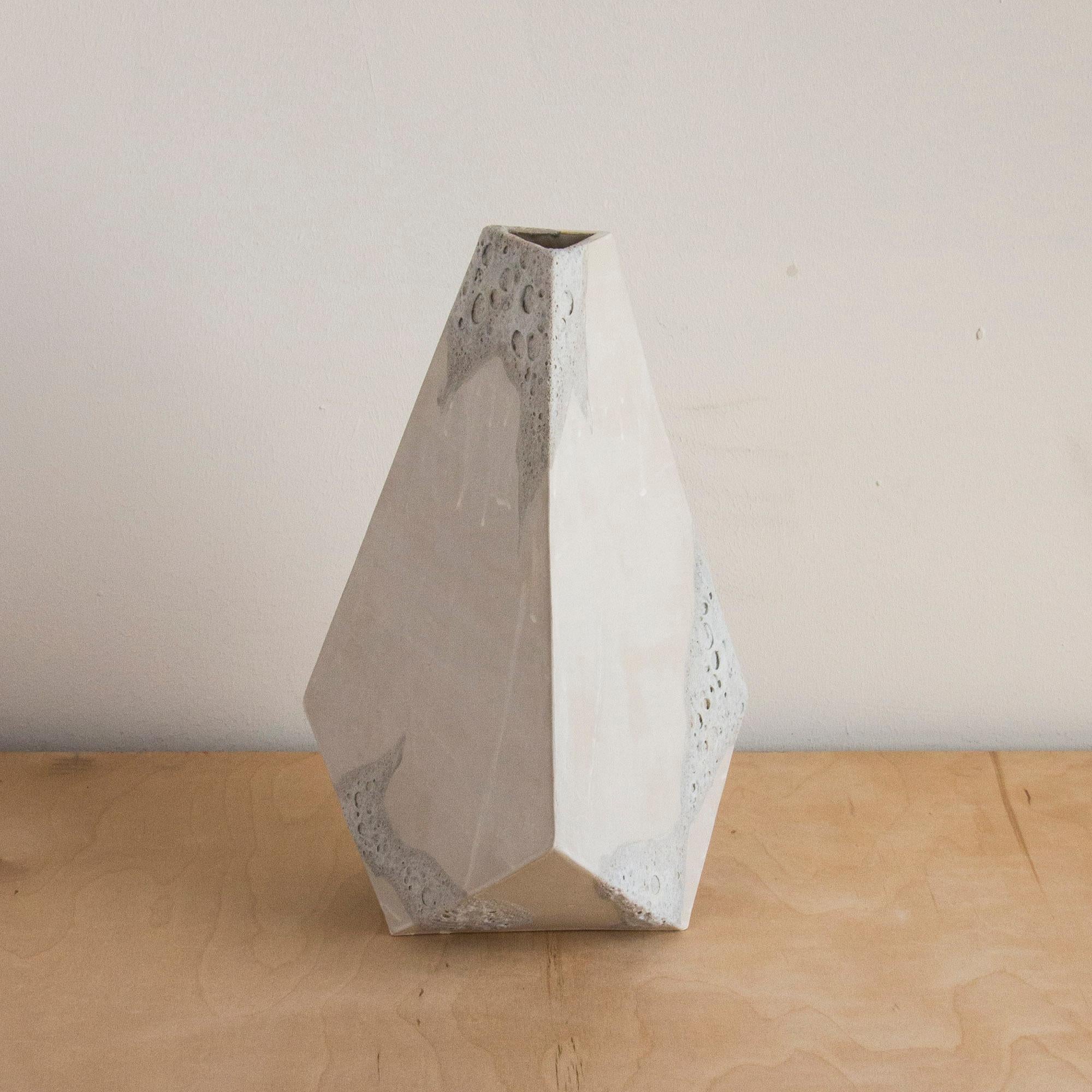 white geometric vases