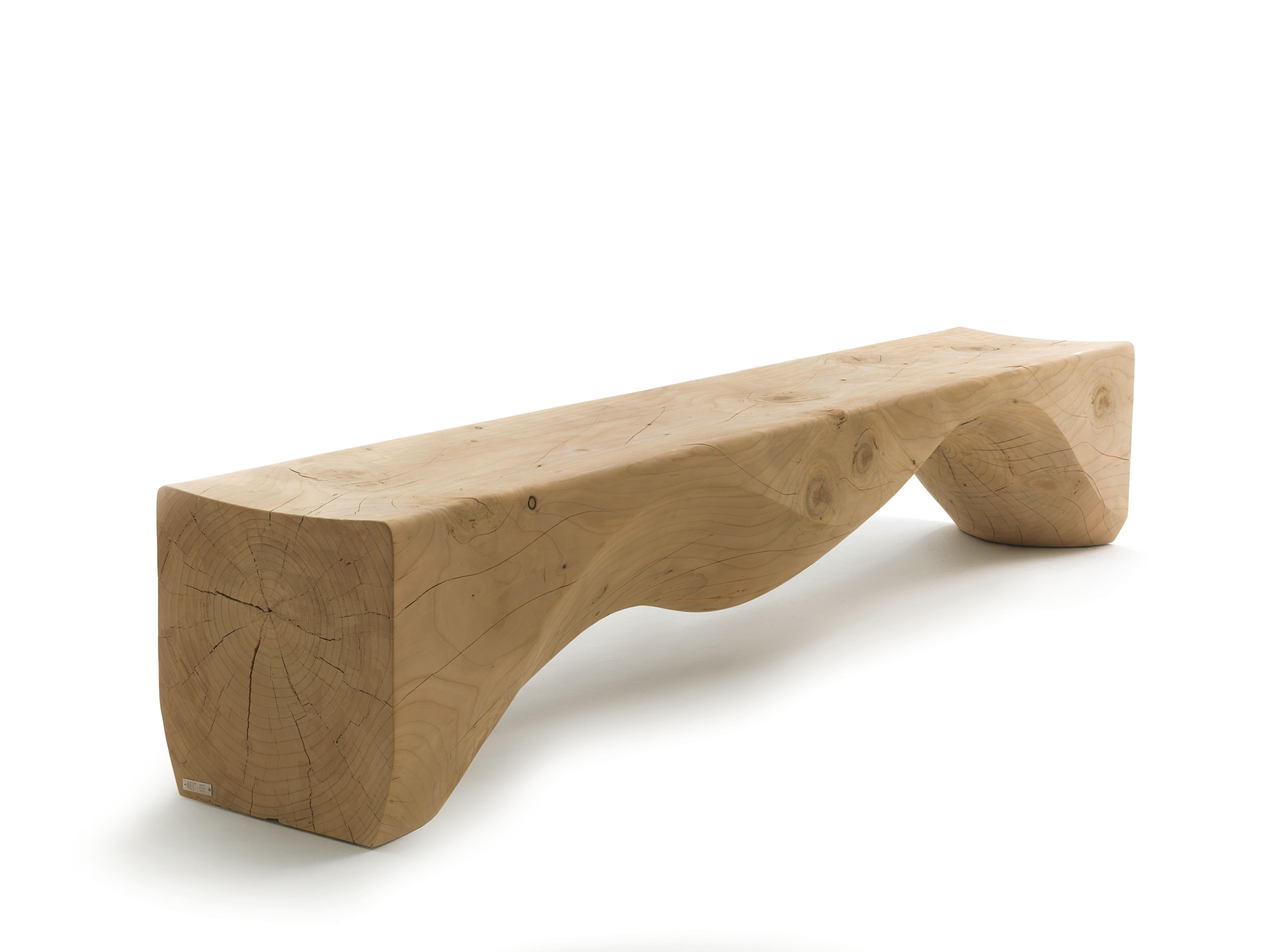 Bench made from a single block of scented cedar. Unique wavy and sinuous movement that evolves through an interplay of fullness alternated with emptiness.