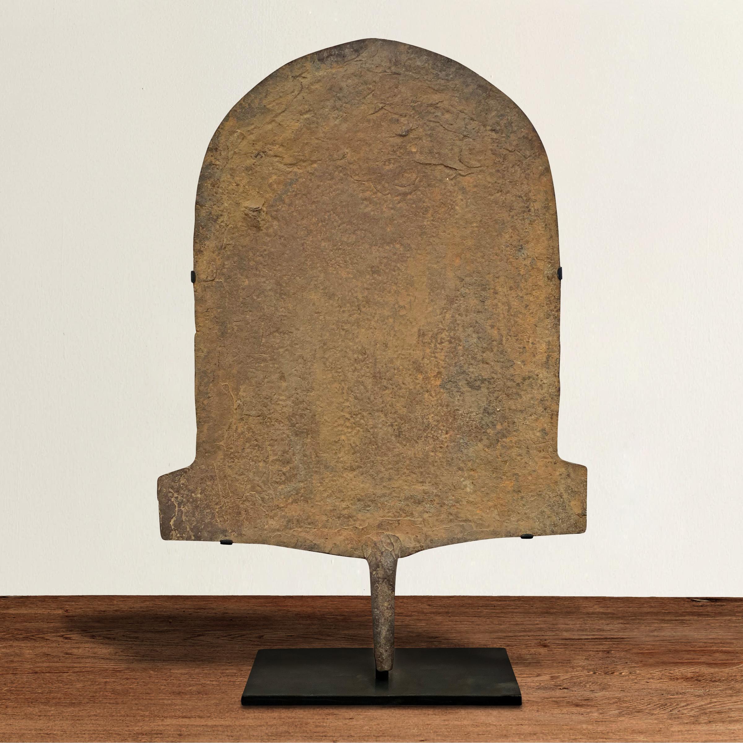 A fantastic 19th century Afo culture wrought iron spade currency piece mounted on custom steel stand. Currency pieces like these were used for large purchases including land or livestock. Such a wonderful organic modern shape!