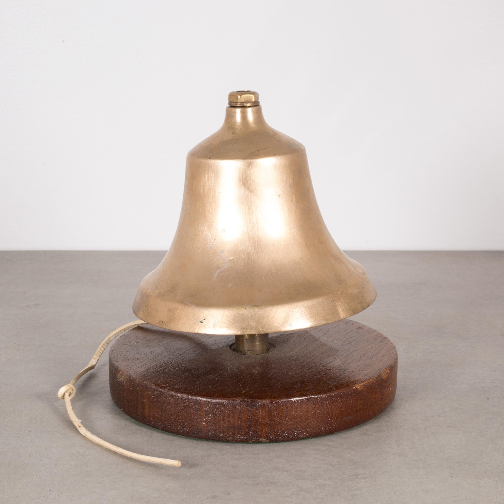 About

This is an original yacht brass bell with rawhide pull string mounted on a solid Walnut base and green felt. This piece has retained its original finish and has the appropriate patina.

Creator Unknown.
Date of manufacture, circa