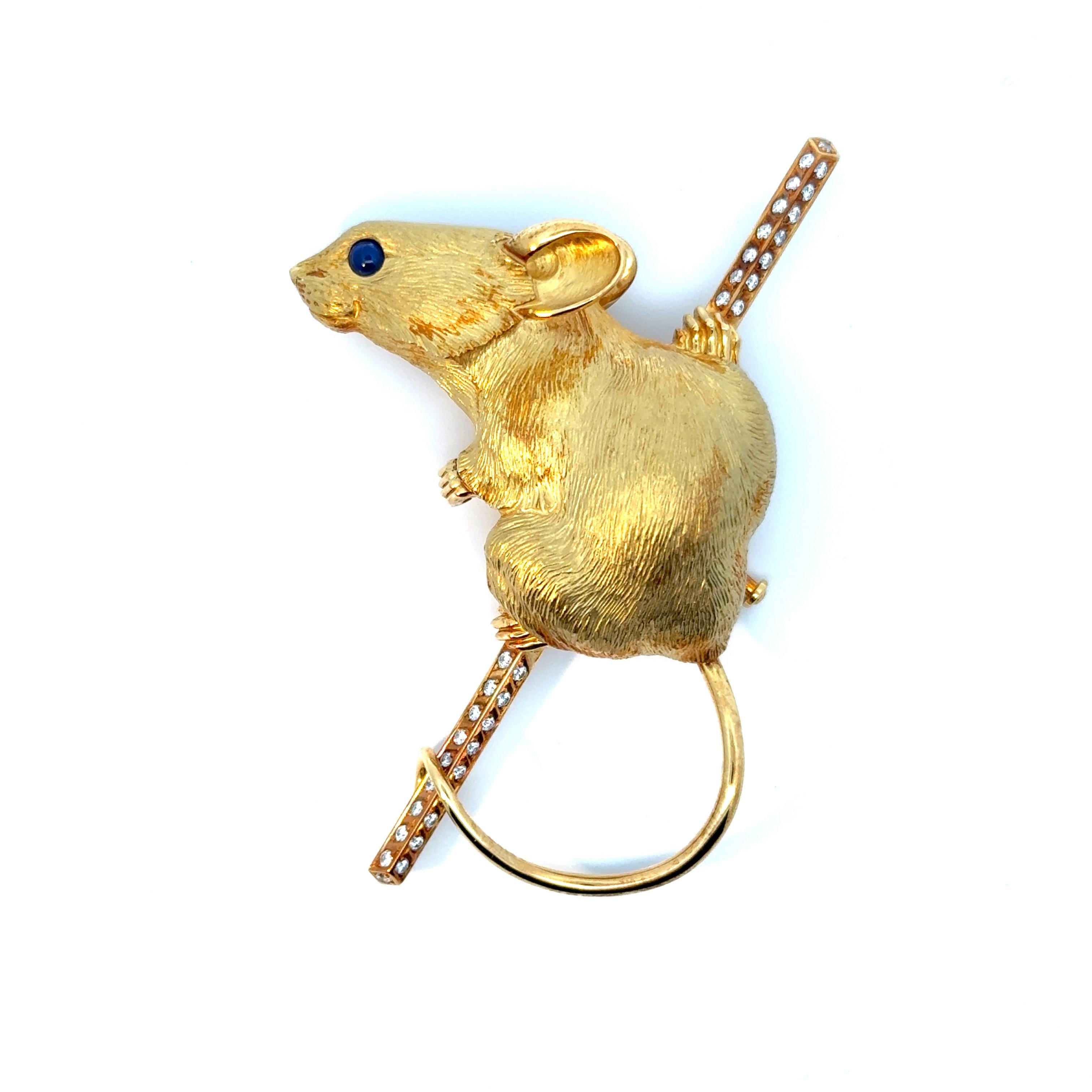 Designed by gemstone-carving-master Alfred Zimmermann, following his designs of his one of a kind gemstones carvings.
This unique brooch has been made in our own goldsmith workshop in Idar-Oberstein. 18ct yellow gold was used by our goldsmiths to