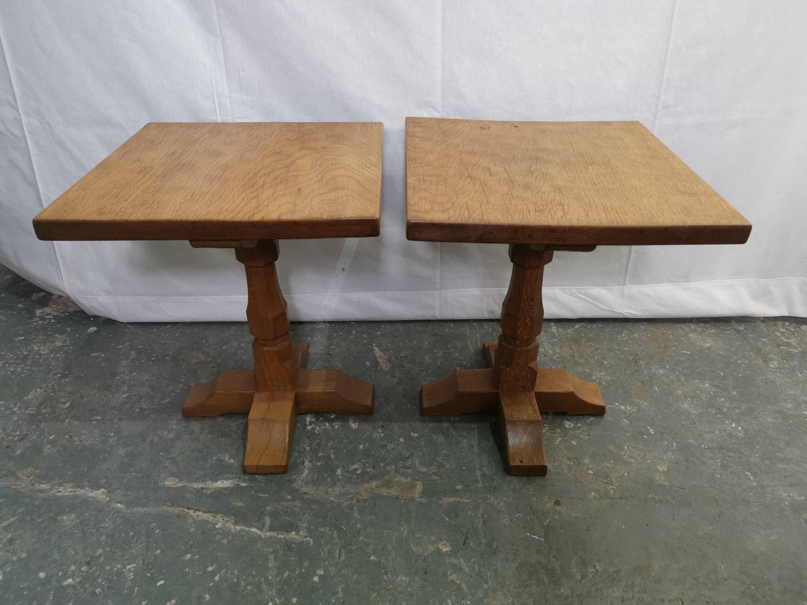 Robert Thompson Mouseman, after a design by.
A rare little pair of Arts and Crafts Yorkshire school oak pedestal side tables with Thompson's trademark pedestals, on four bracket style feet and adzed finish.
One of the apprentices, earlier quality.